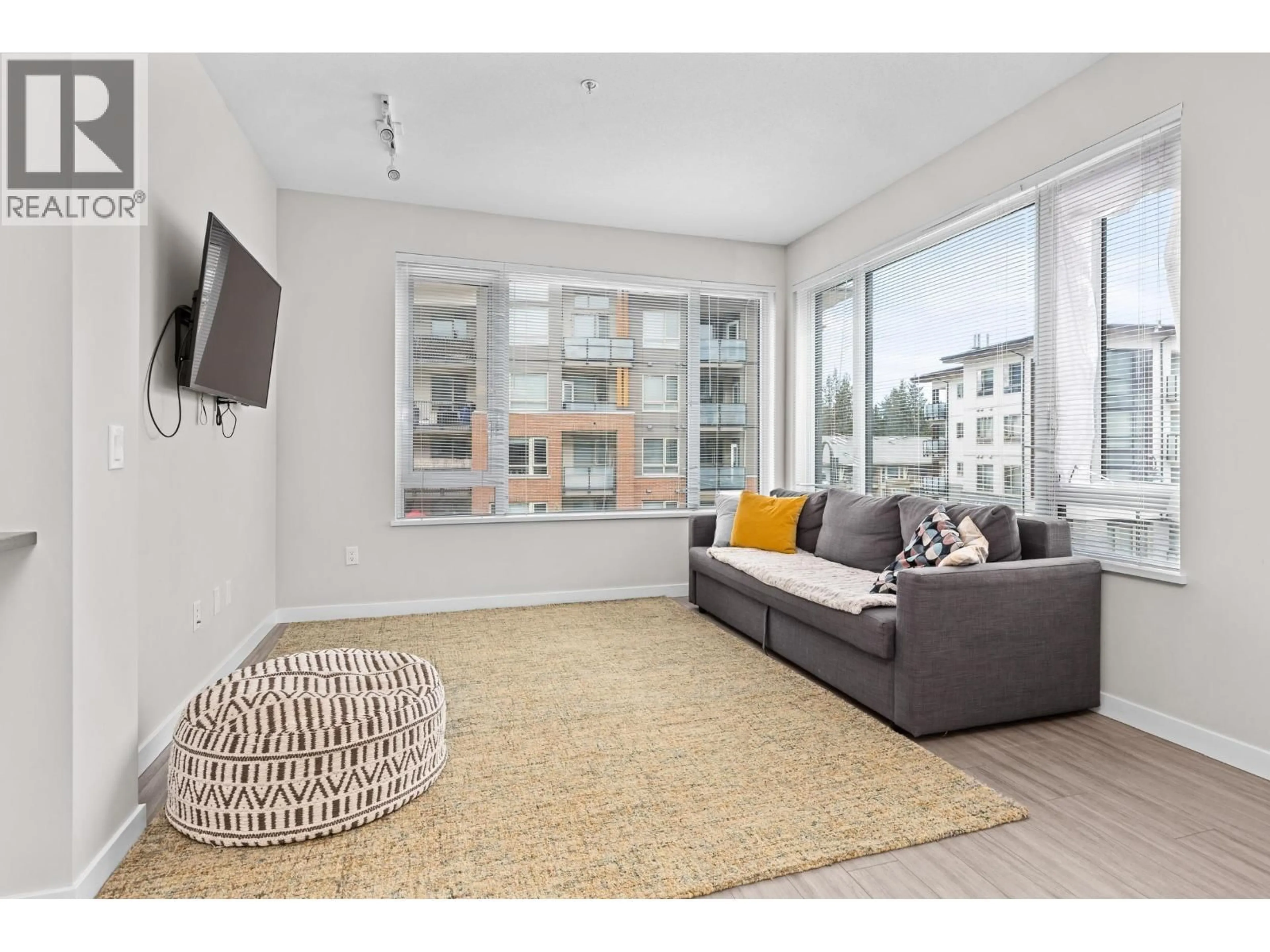 Living room with furniture, unknown for 212 - 2663 LIBRARY LANE, North Vancouver British Columbia V7J0B9