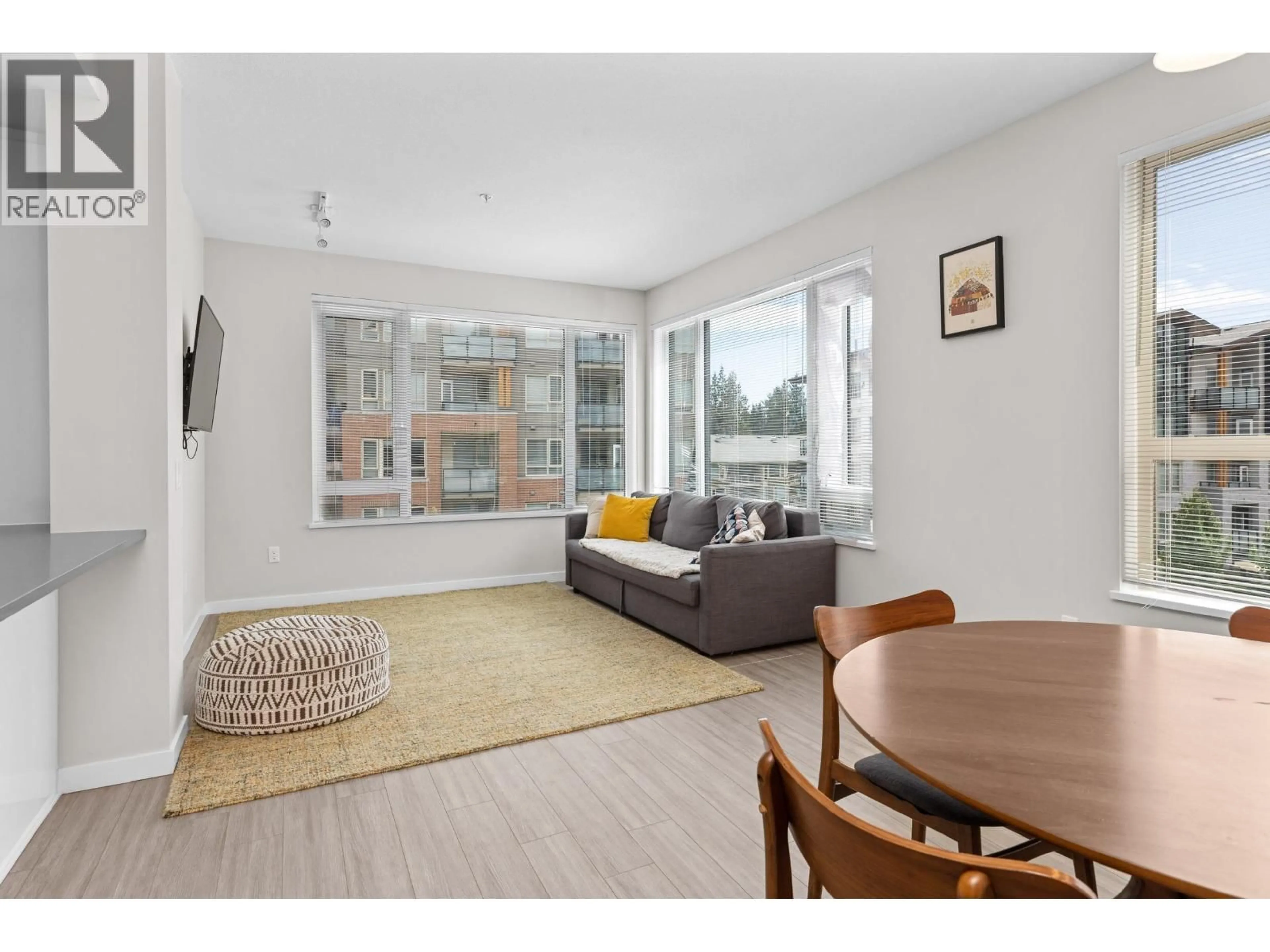 Living room with furniture, unknown for 212 - 2663 LIBRARY LANE, North Vancouver British Columbia V7J0B9