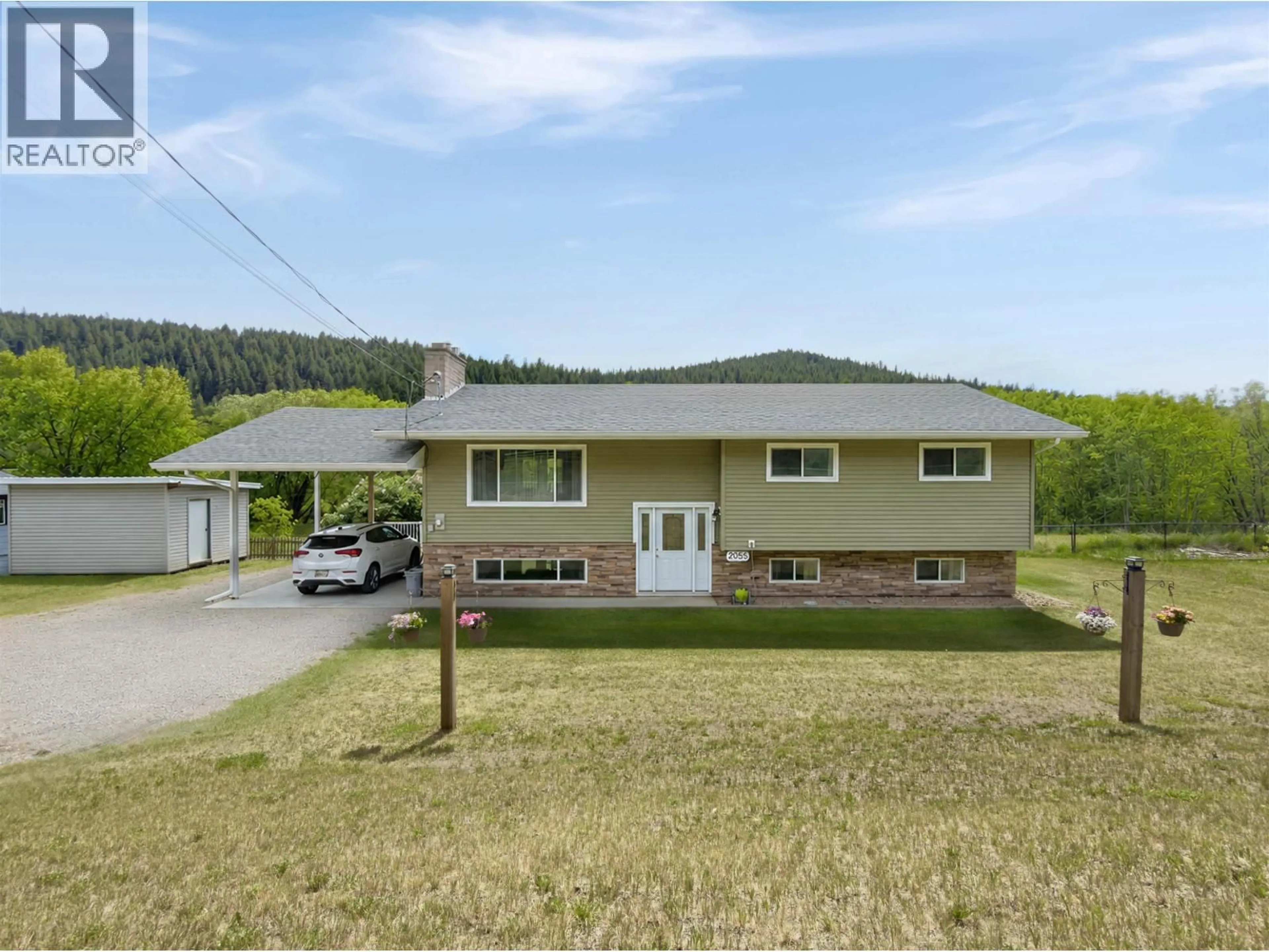 A pic from outside/outdoor area/front of a property/back of a property/a pic from drone, street for 2055 COMMODORE CRESCENT, Williams Lake British Columbia V2G2P2