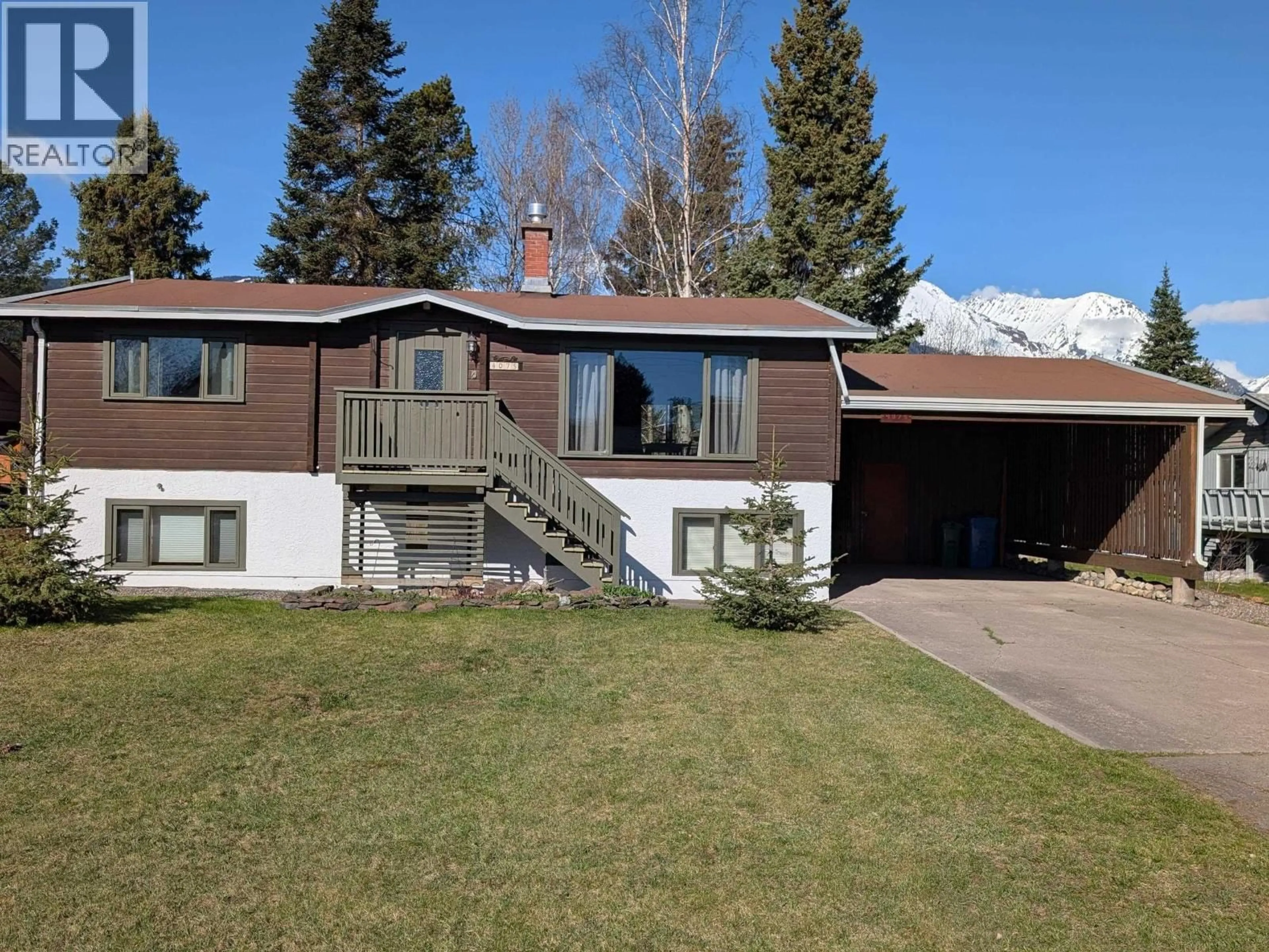 Home with vinyl exterior material, mountain view for 4075 7TH AVENUE, Smithers British Columbia V0J2N0