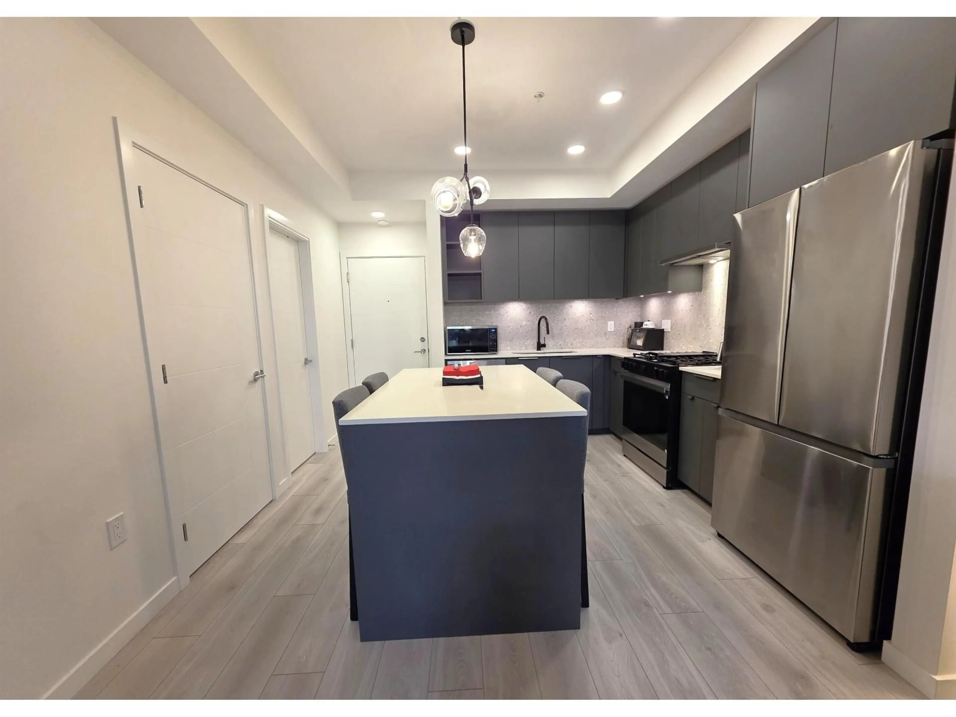 Open concept kitchen, unknown for 117 - 7936 206 STREET, Langley British Columbia V2Y3X1