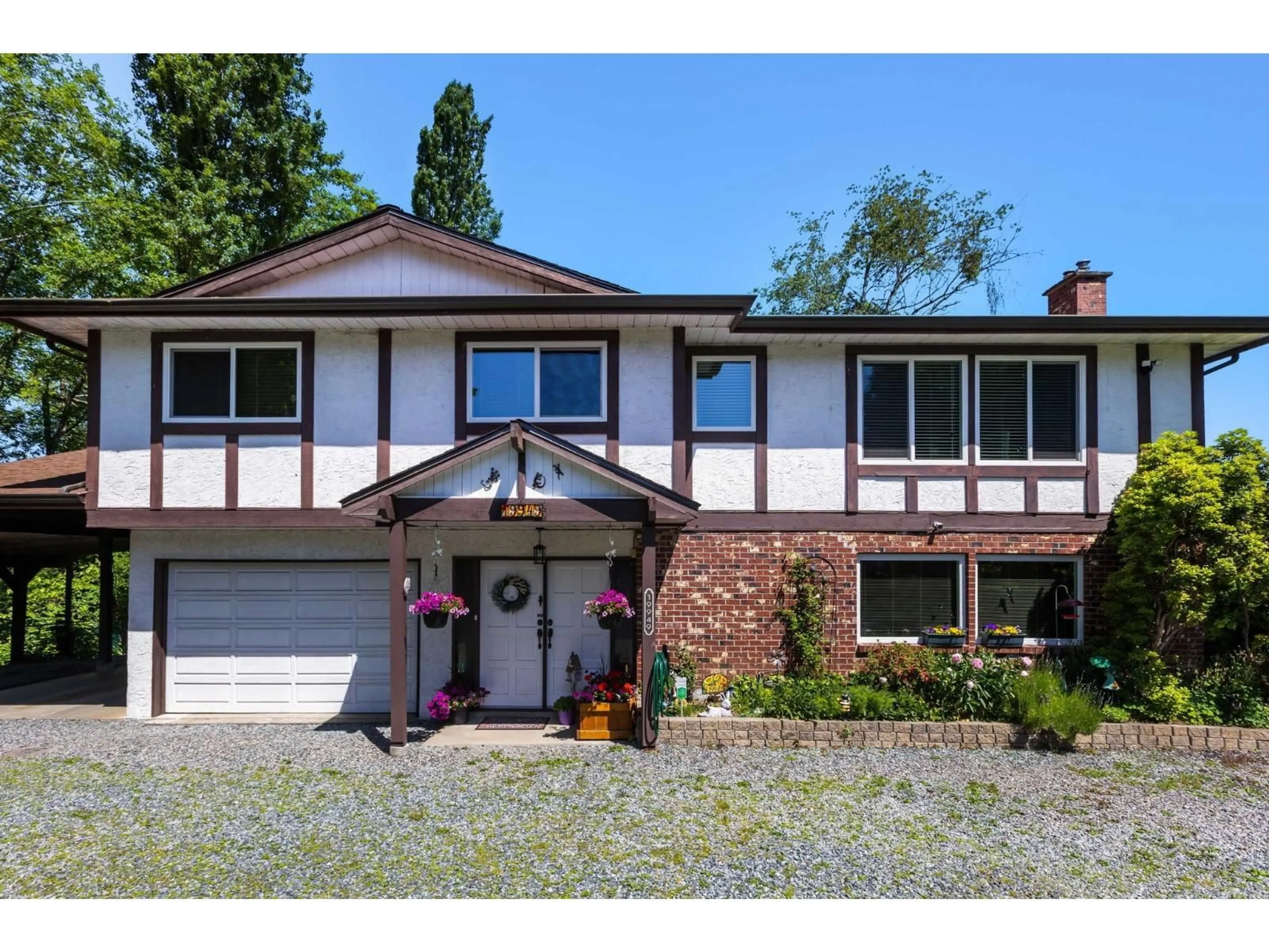 Home with vinyl exterior material, street for 19949 51 AVENUE, Langley British Columbia V3A7P2