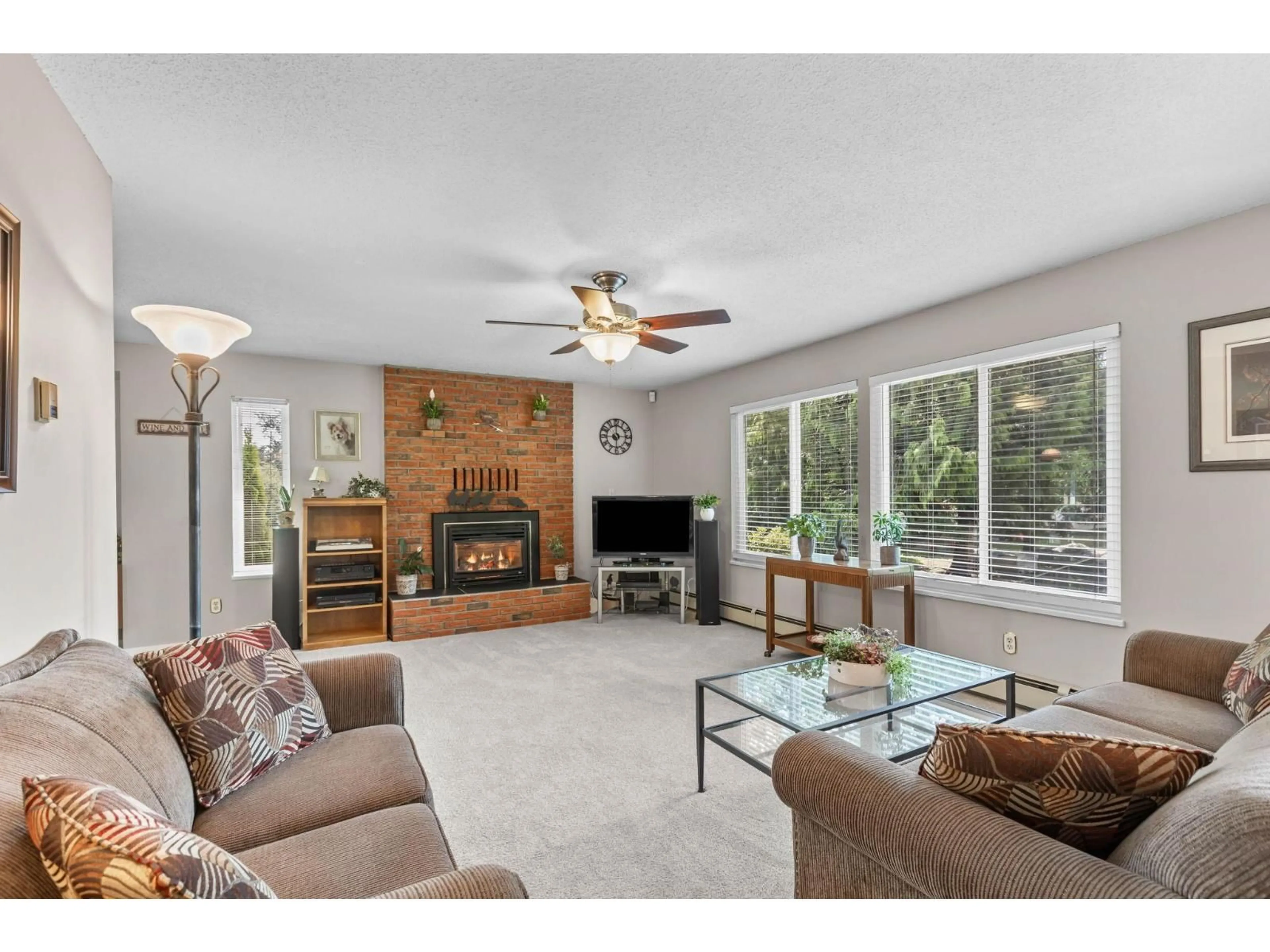 Living room with furniture, ceramic/tile floor for 19949 51 AVENUE, Langley British Columbia V3A7P2