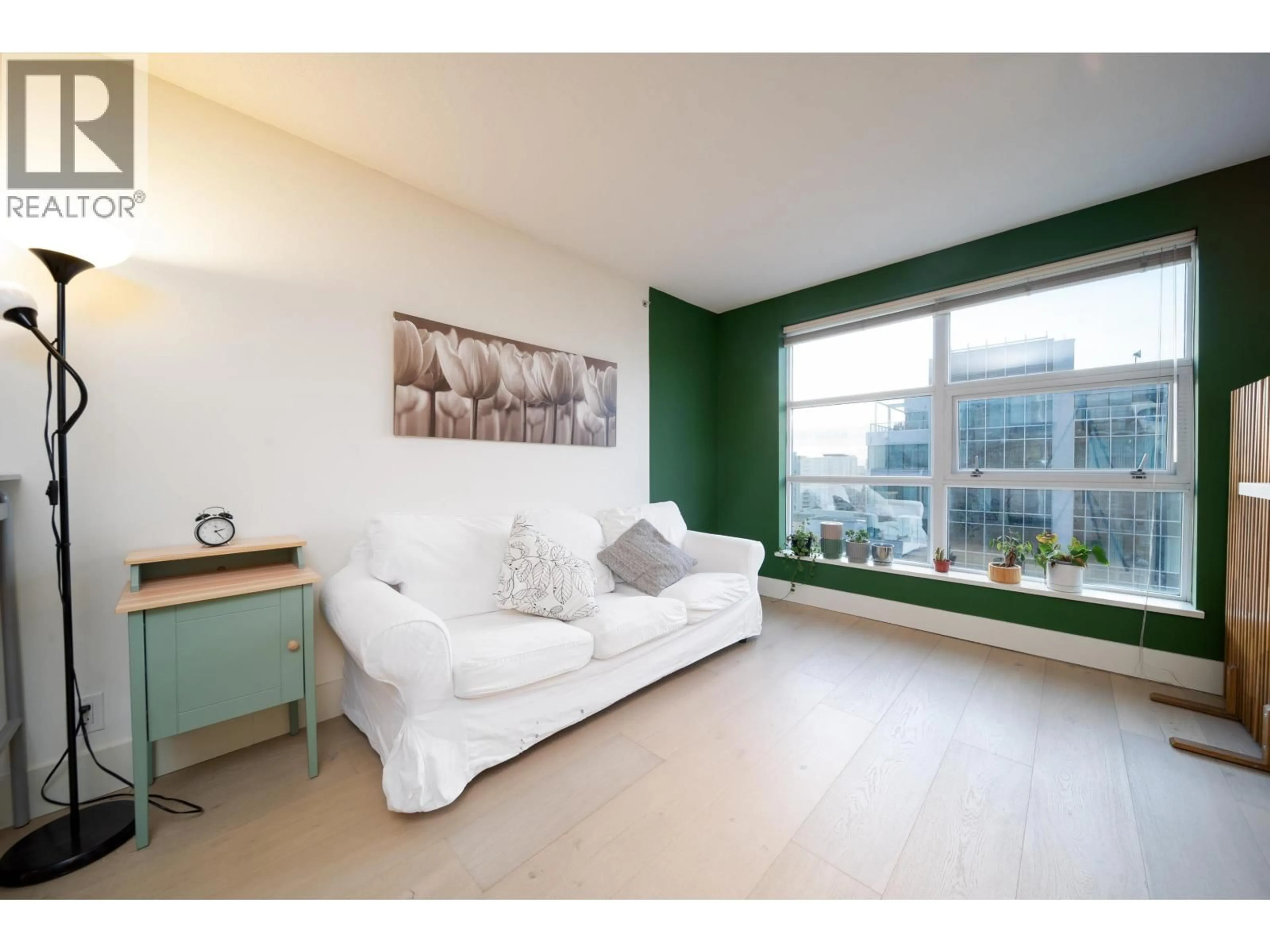 Living room with furniture, wood/laminate floor for 1709 - 6068 NO. 3 ROAD, Richmond British Columbia V6Y4M7