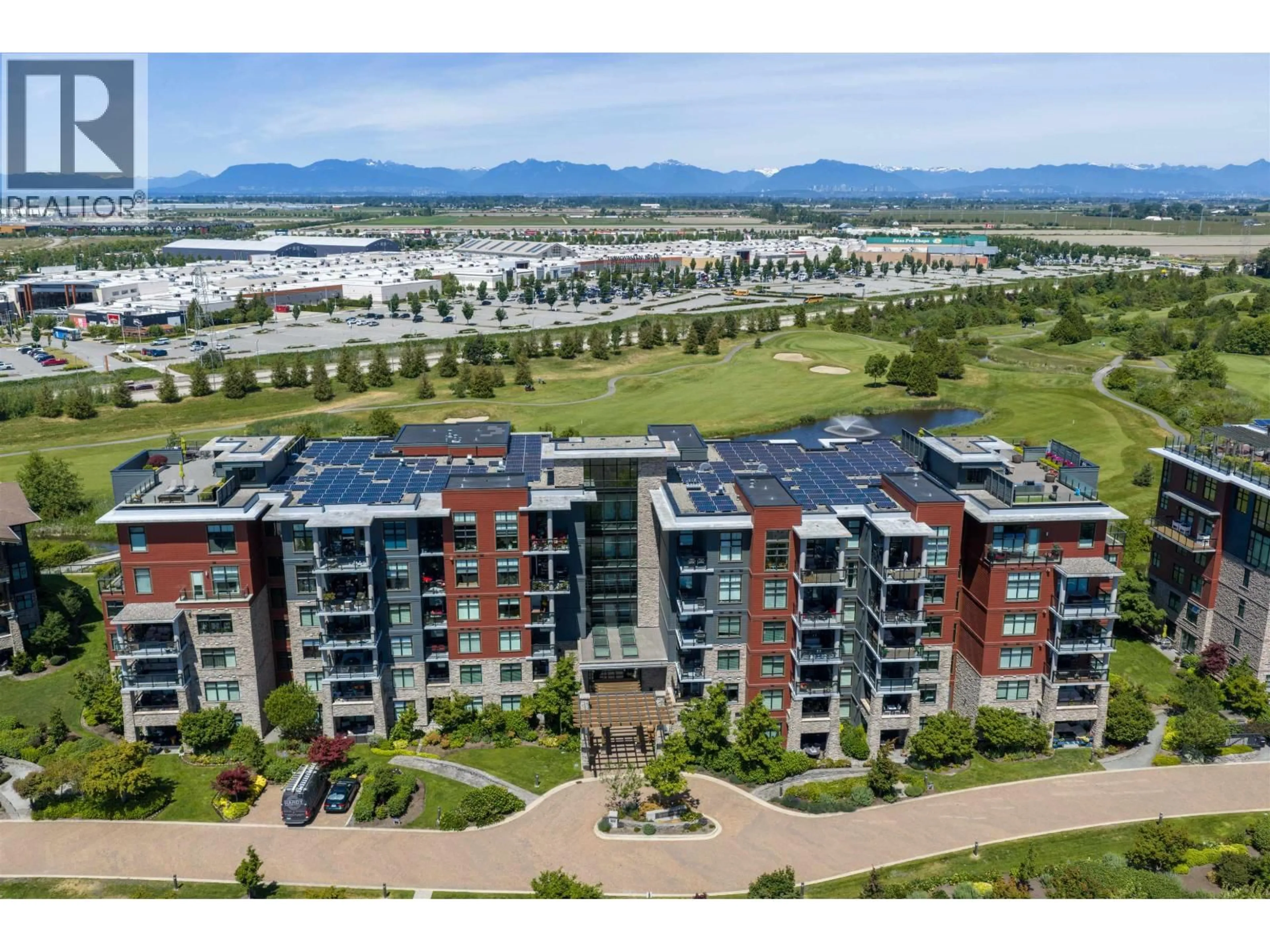 A pic from outside/outdoor area/front of a property/back of a property/a pic from drone, water/lake/river/ocean view for 102 - 5011 SPRINGS BOULEVARD, Tsawwassen British Columbia V4M0B6