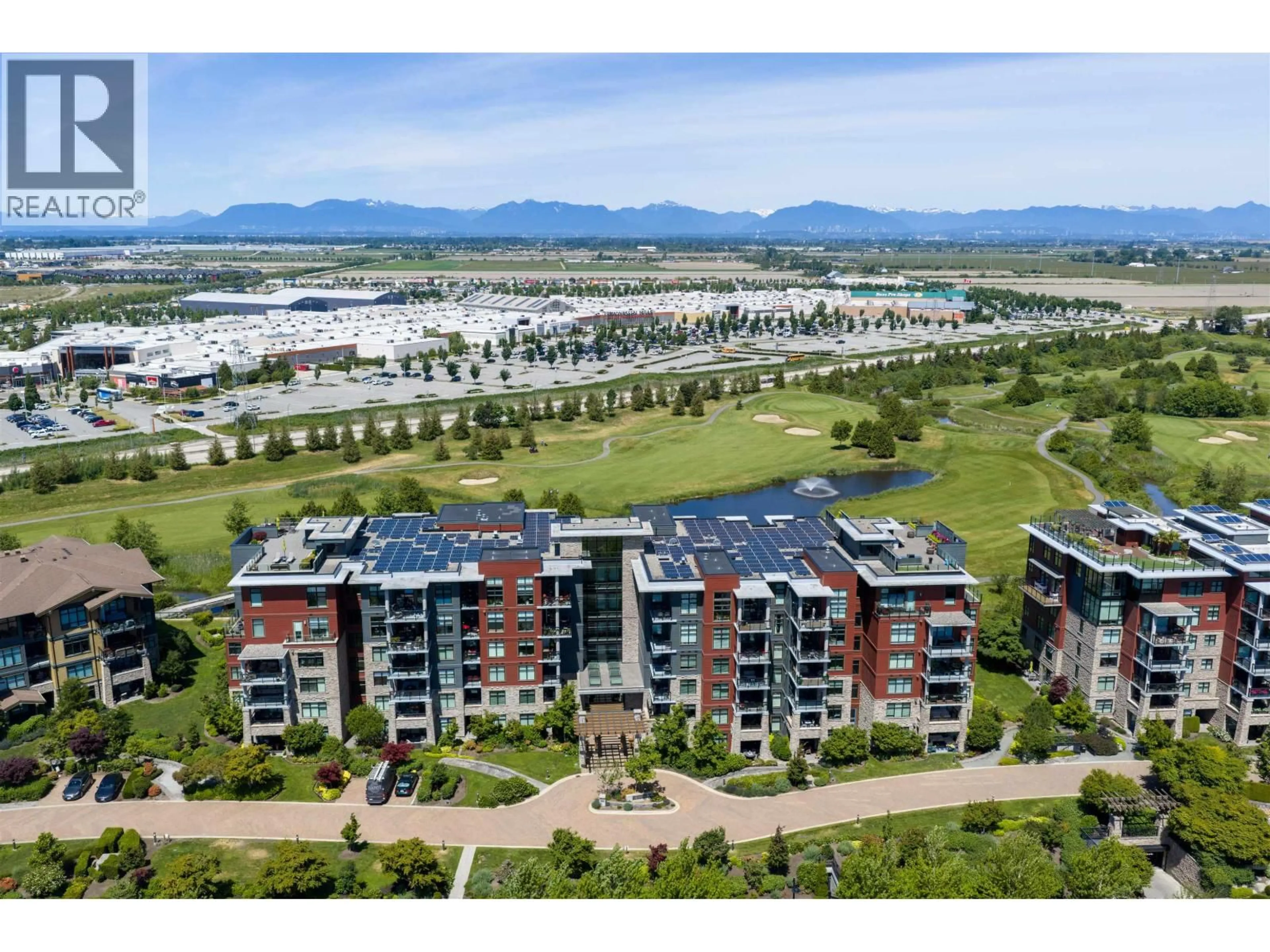 A pic from outside/outdoor area/front of a property/back of a property/a pic from drone, mountain view for 102 - 5011 SPRINGS BOULEVARD, Tsawwassen British Columbia V4M0B6