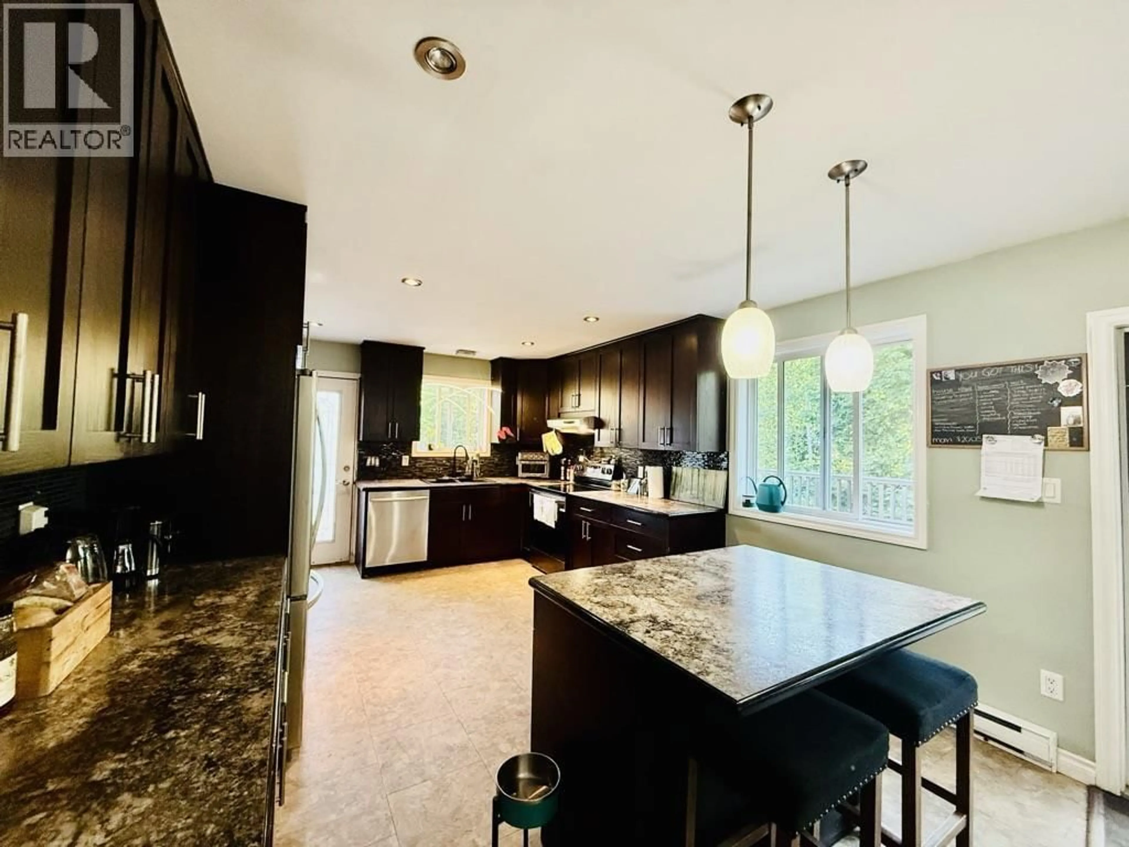 Open concept kitchen, ceramic/tile floor for 1930 SANDERS STREET, Hazelton British Columbia V0J2J1