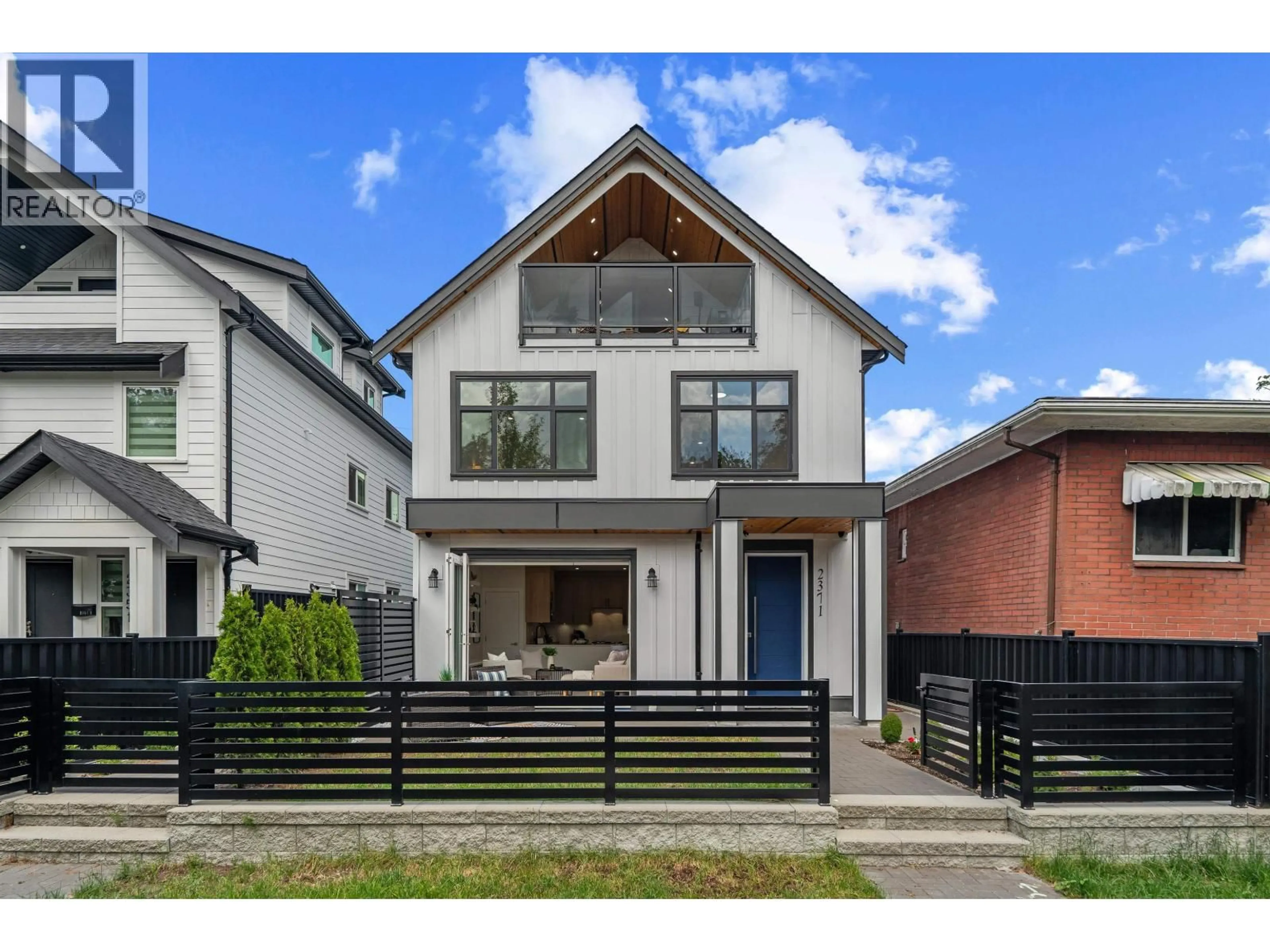 Home with brick exterior material, street for 2371 ADANAC STREET, Vancouver British Columbia V5L2E9