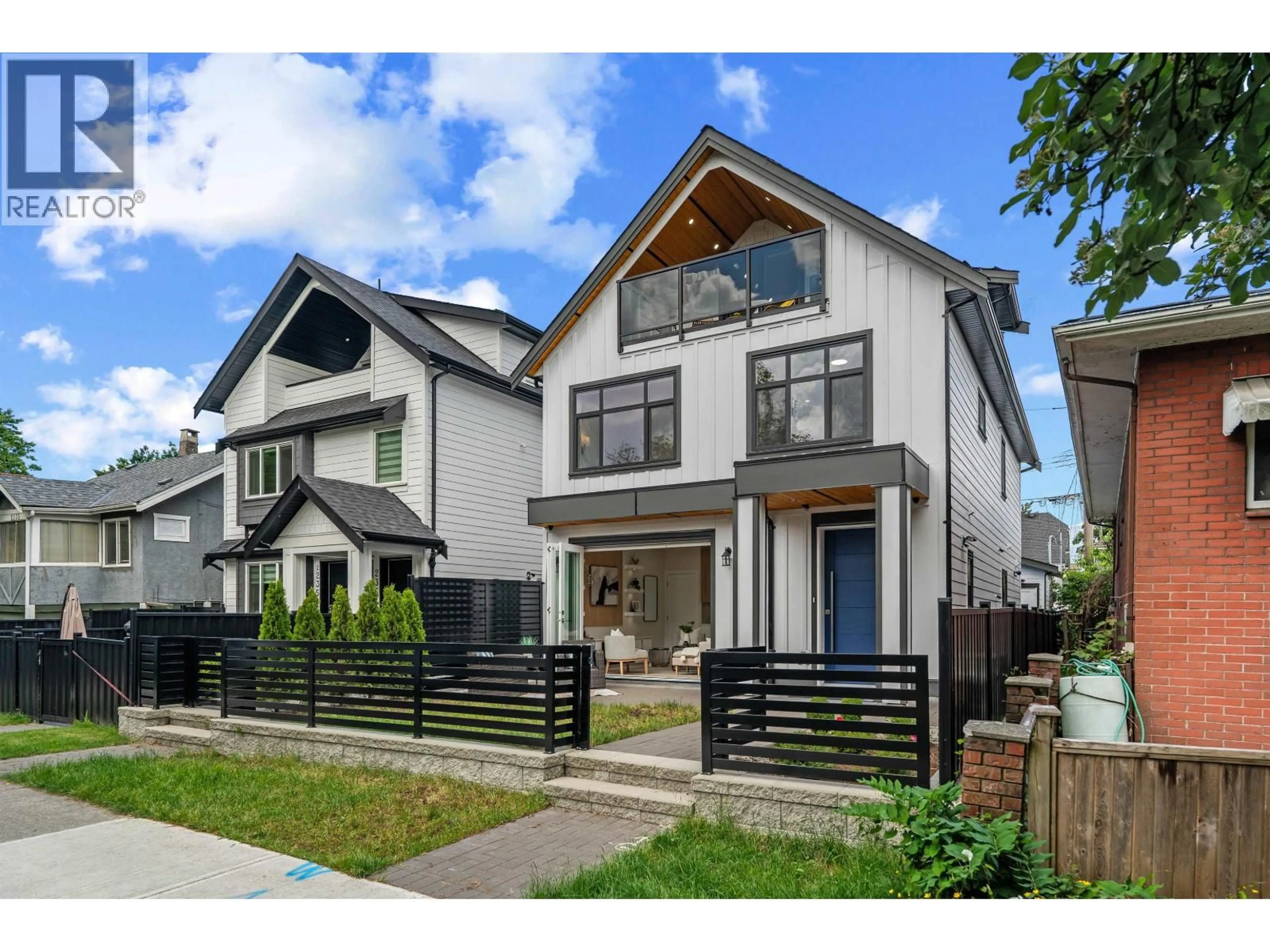 Home with brick exterior material, street for 2371 ADANAC STREET, Vancouver British Columbia V5L2E9