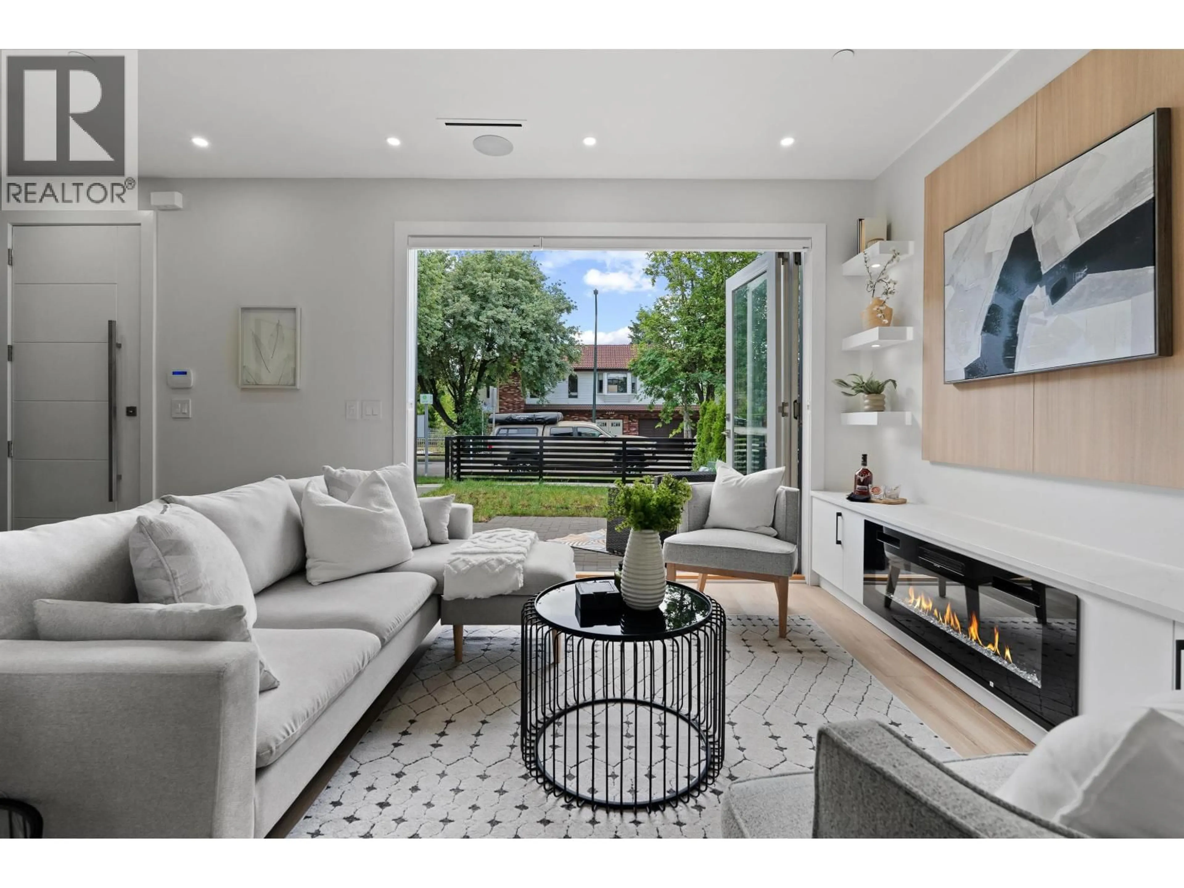Living room with furniture, ceramic/tile floor for 2371 ADANAC STREET, Vancouver British Columbia V5L2E9