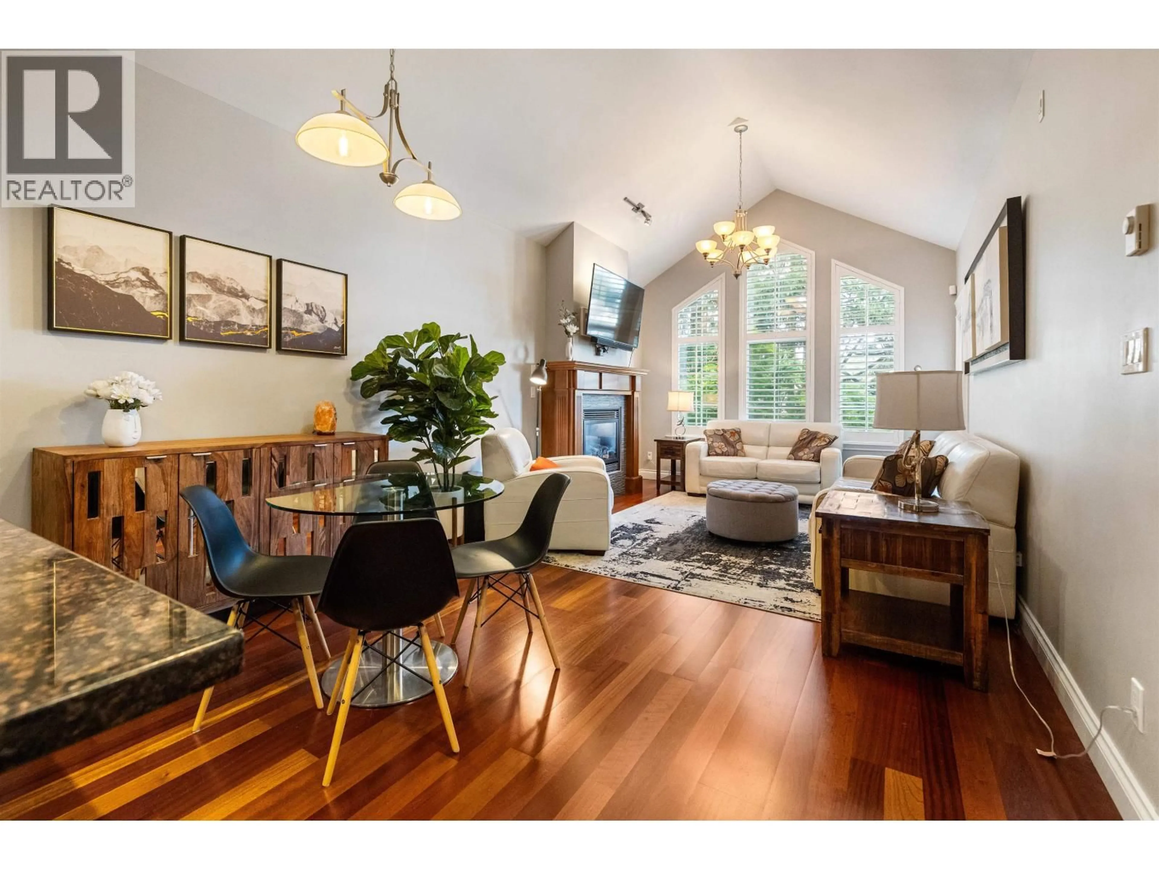 Living room with furniture, wood/laminate floor for 203 - 1642 56 STREET, Tsawwassen British Columbia V4L0A2