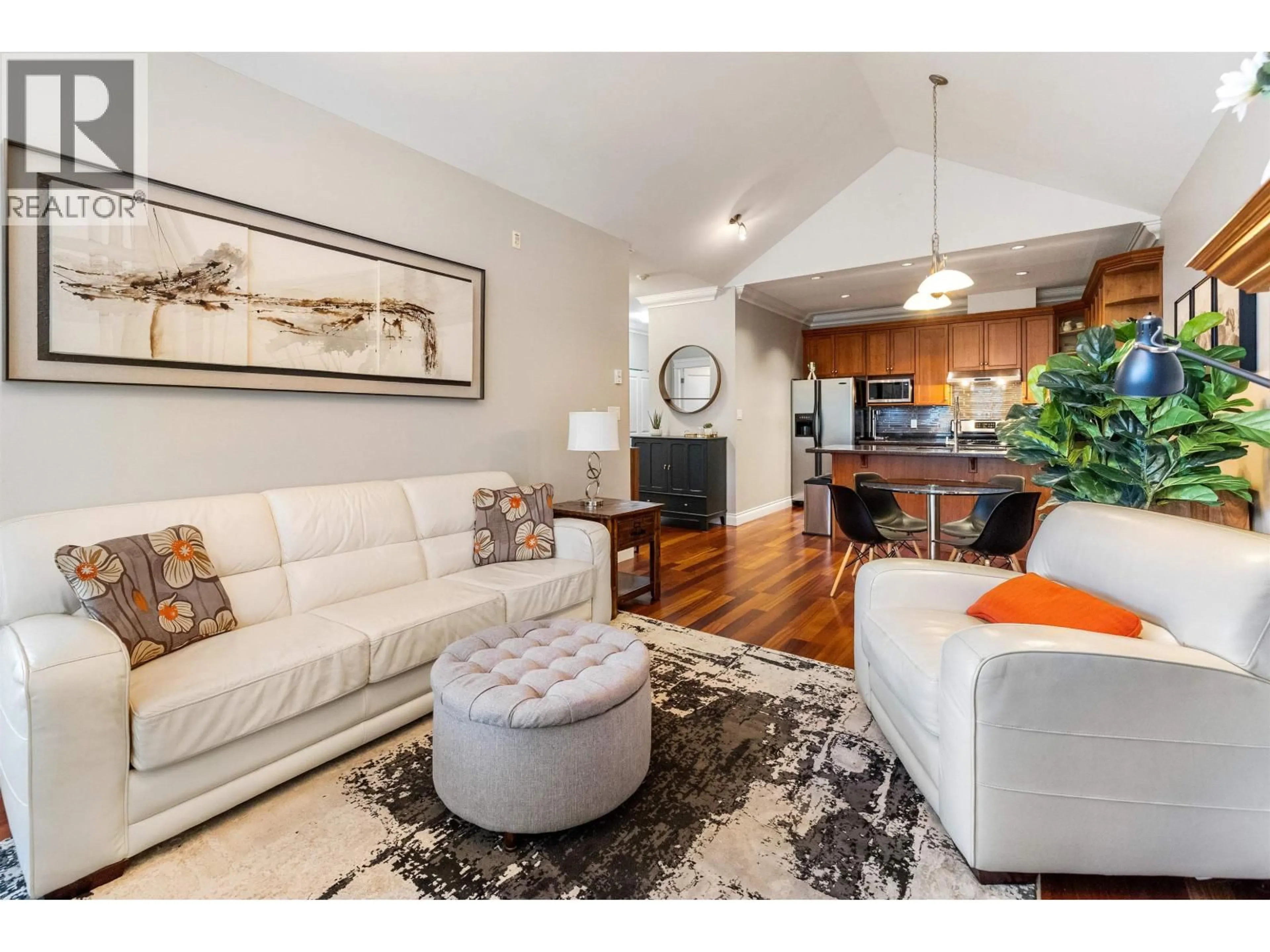Living room with furniture, wood/laminate floor for 203 - 1642 56 STREET, Tsawwassen British Columbia V4L0A2