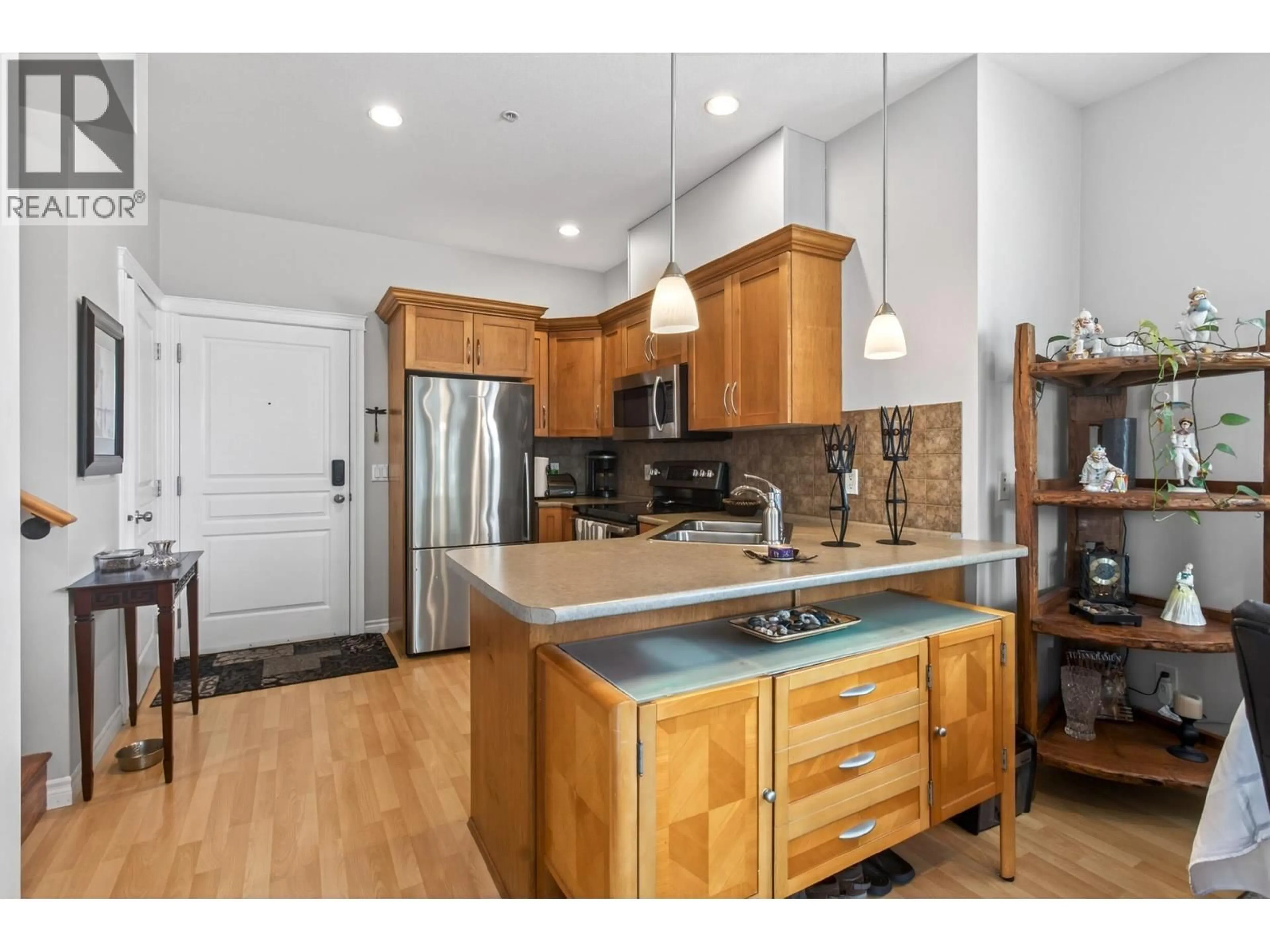 Open concept kitchen, wood/laminate floor for 202 - 2655 MARY HILL ROAD, Port Coquitlam British Columbia V3C6R9