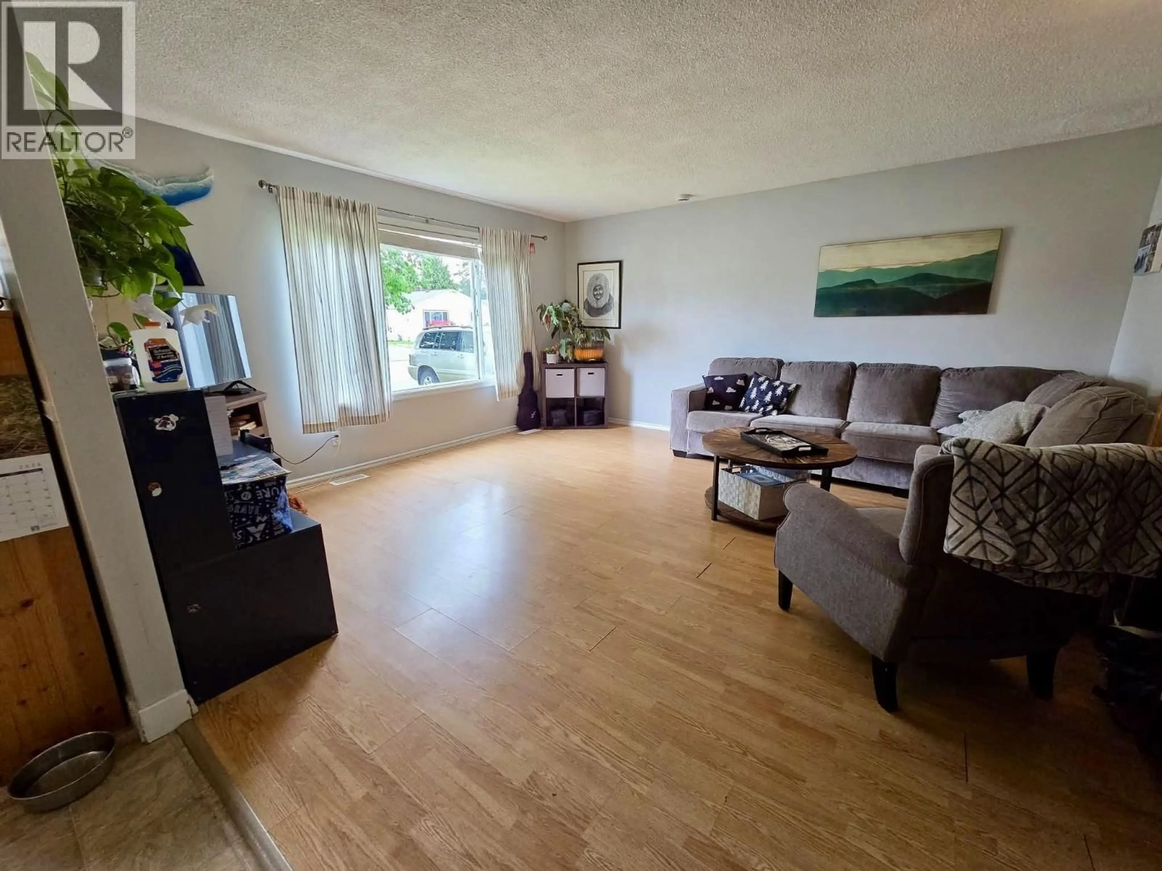 Living room with furniture, wood/laminate floor for 4636 WEBER AVENUE, Terrace British Columbia V8G1B8