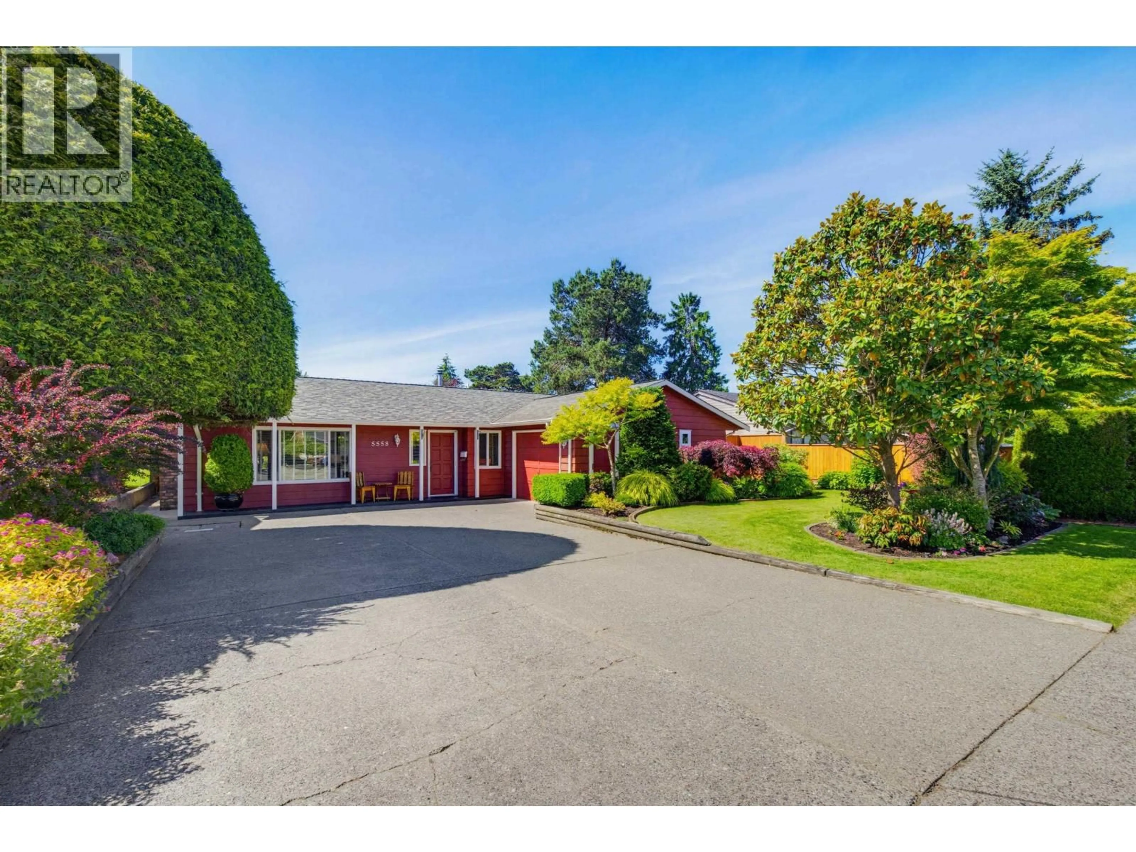 A pic from outside/outdoor area/front of a property/back of a property/a pic from drone, street for 5558 49 AVENUE, Delta British Columbia V4K3N8