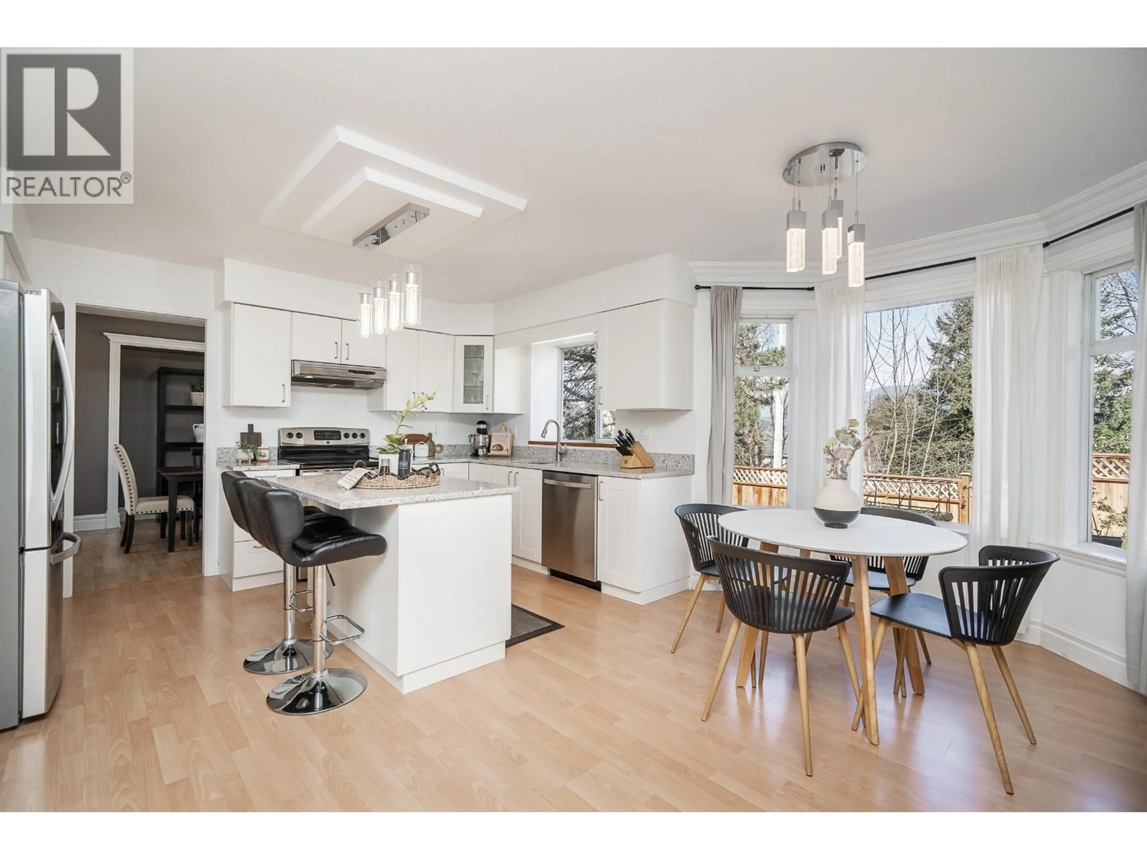 Open concept kitchen, wood/laminate floor for 2653 KLASSEN COURT, Port Coquitlam British Columbia V3C5Y8