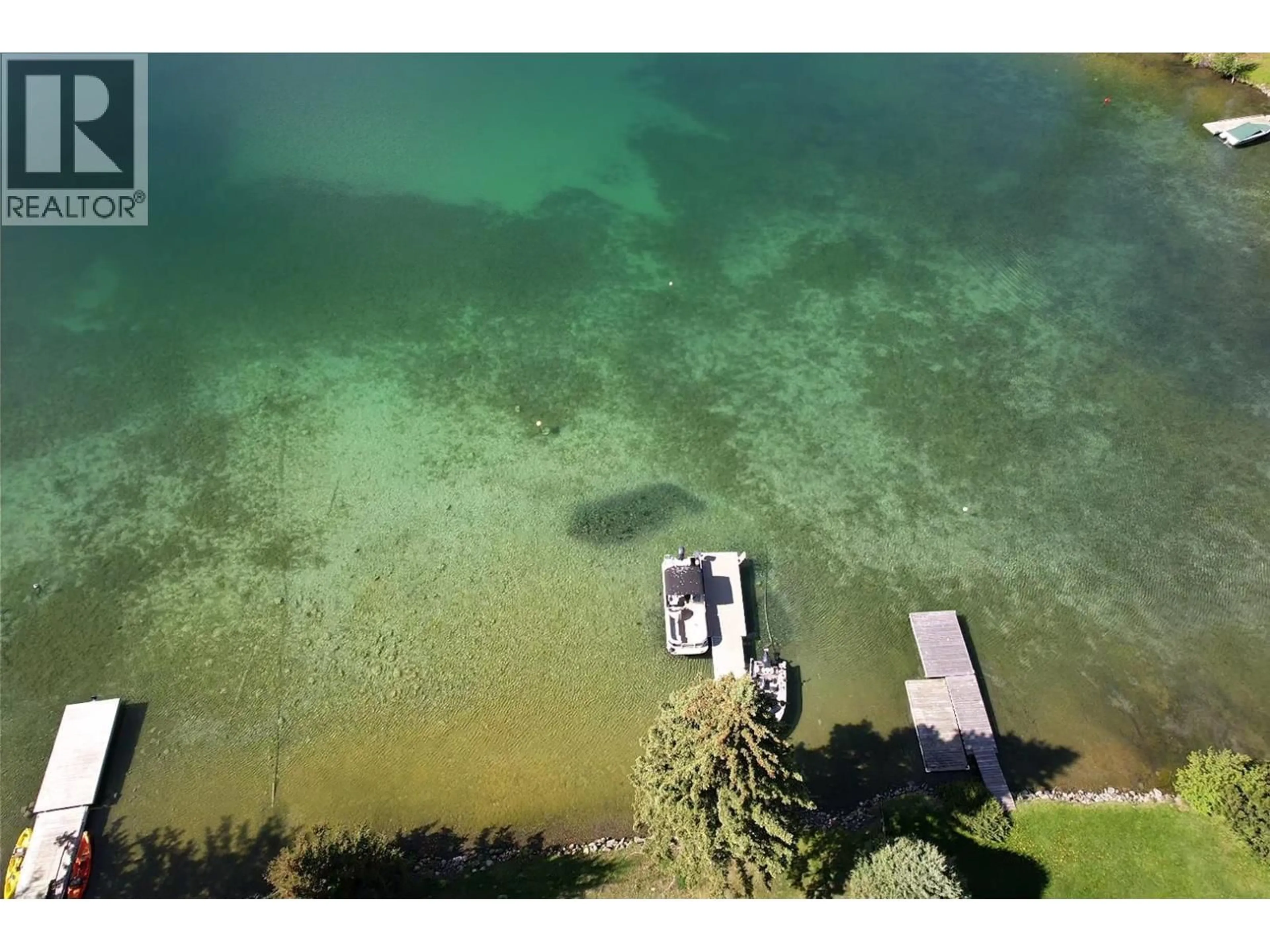A pic from outside/outdoor area/front of a property/back of a property/a pic from drone, water/lake/river/ocean view for 7560 PETTYJOHN ROAD, Deka Lake / Sulphurous / Hathaway Lakes British Columbia V0K1X3