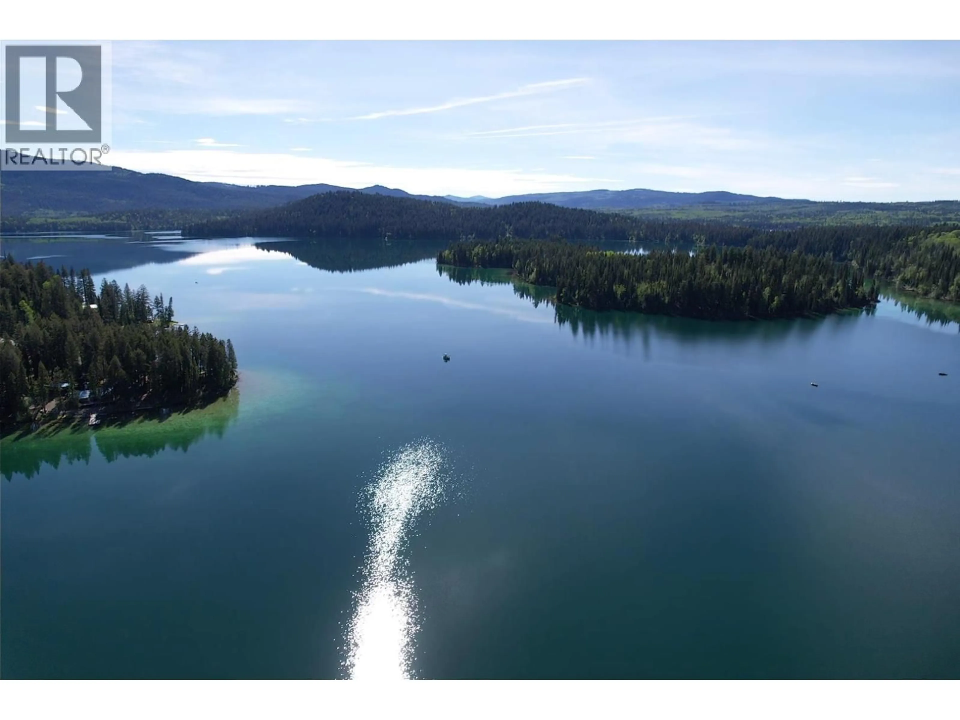 A pic from outside/outdoor area/front of a property/back of a property/a pic from drone, water/lake/river/ocean view for 7560 PETTYJOHN ROAD, Deka Lake / Sulphurous / Hathaway Lakes British Columbia V0K1X3