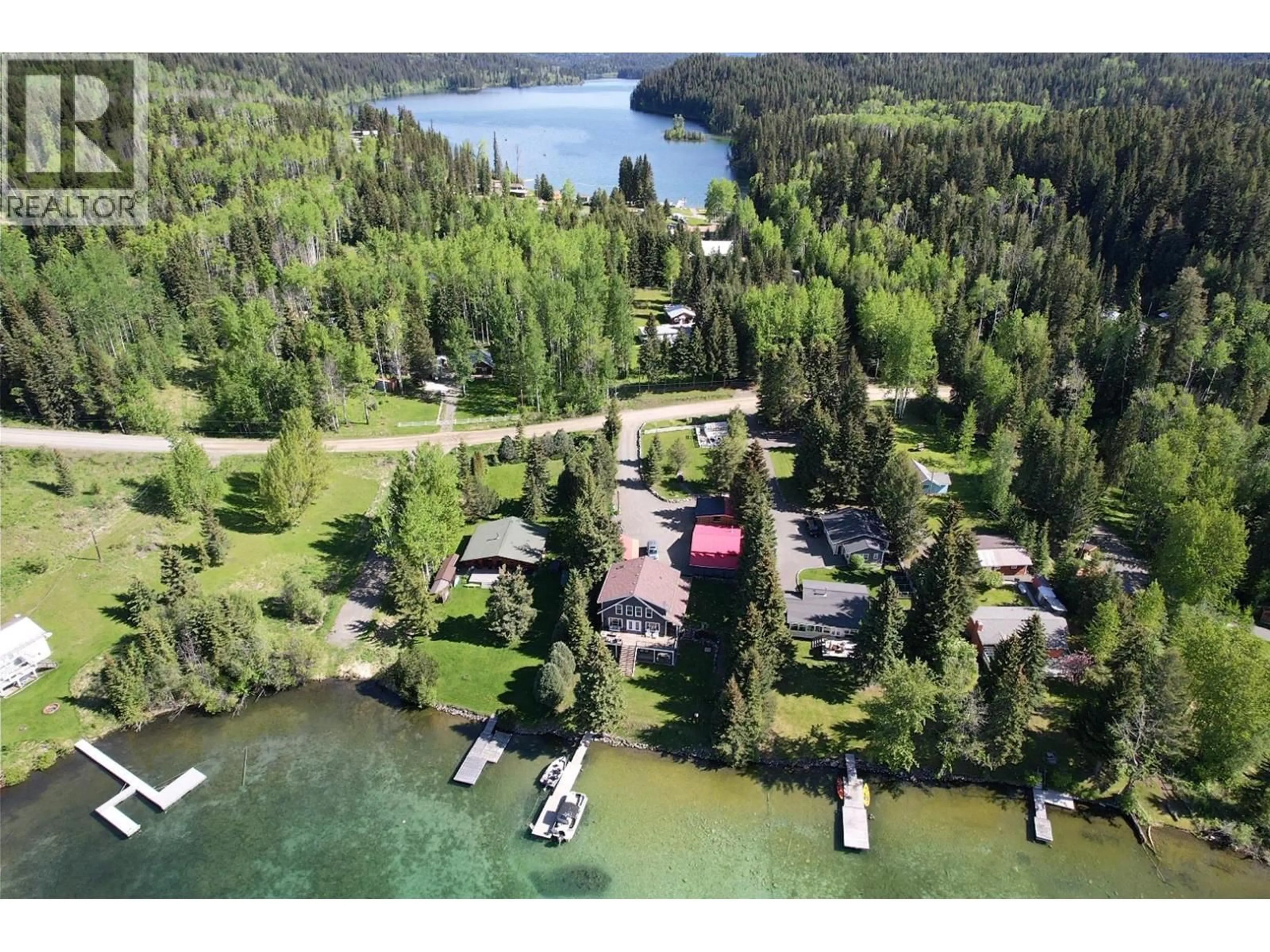 A pic from outside/outdoor area/front of a property/back of a property/a pic from drone, water/lake/river/ocean view for 7560 PETTYJOHN ROAD, Deka Lake / Sulphurous / Hathaway Lakes British Columbia V0K1X3