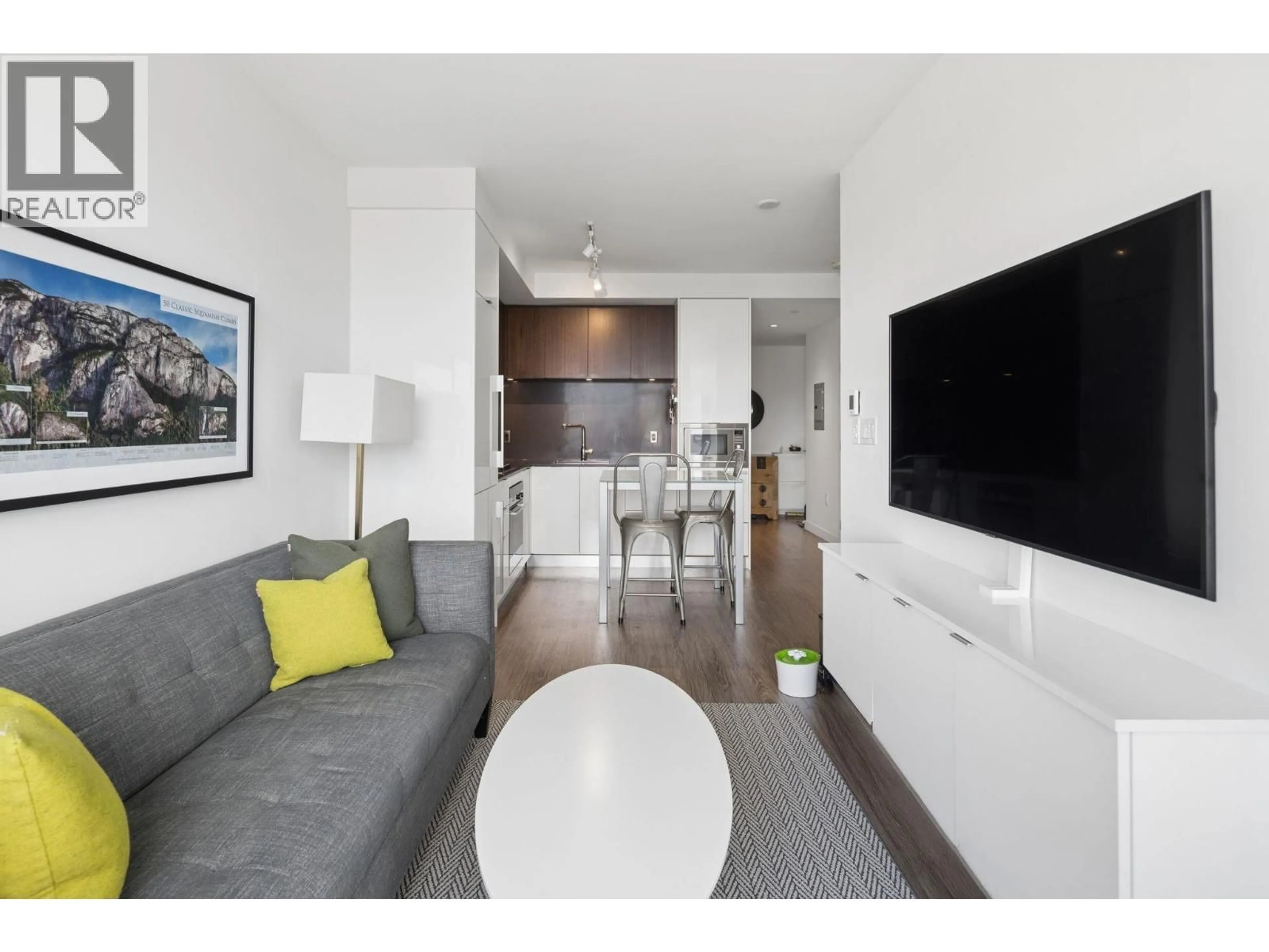 Living room with furniture, wood/laminate floor for 604 - 209 7TH AVENUE, Vancouver British Columbia V5T0H3