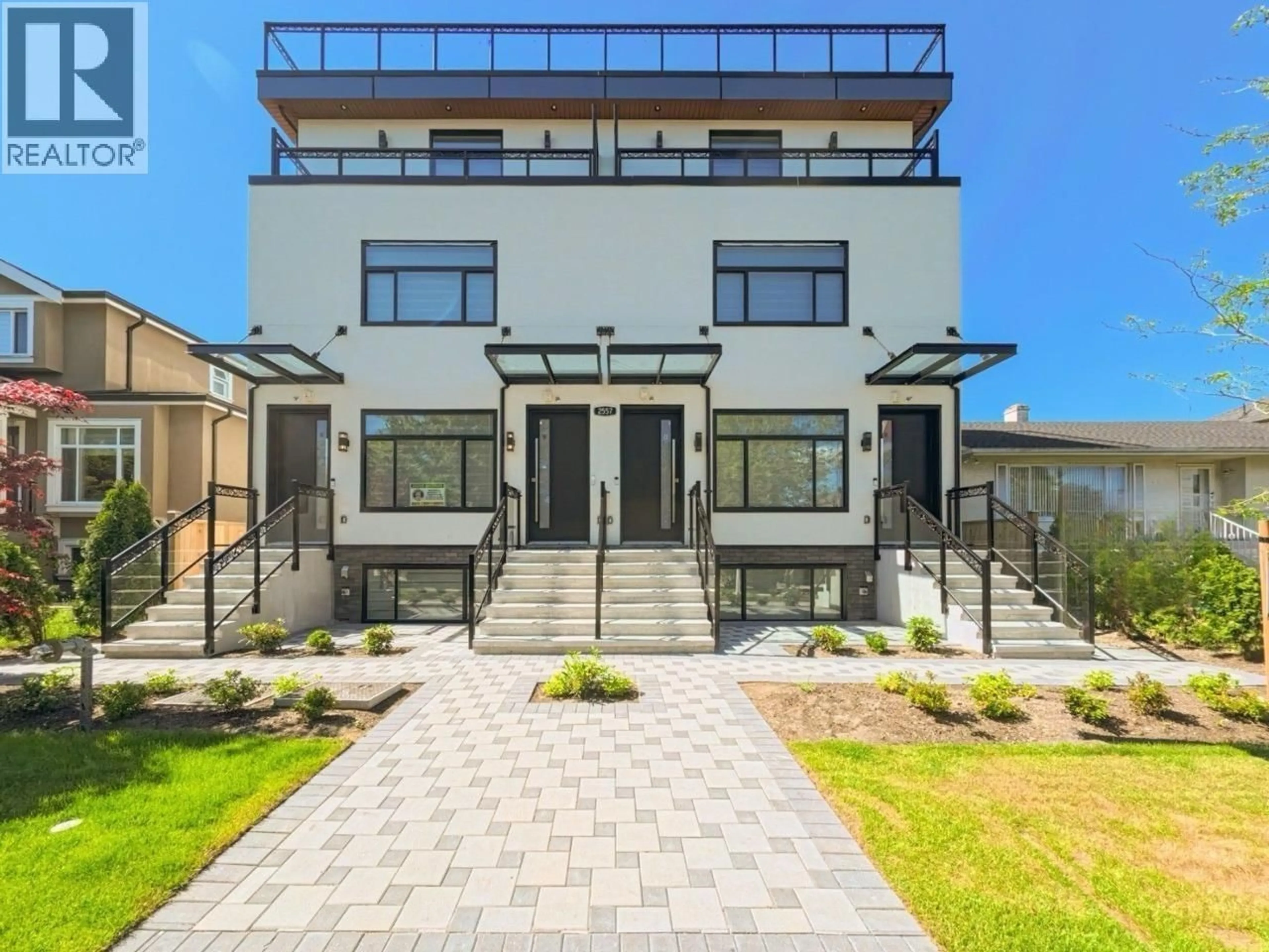 Home with brick exterior material, street for 3 - 2557 KING EDWARD AVENUE, Vancouver British Columbia V6L1T5