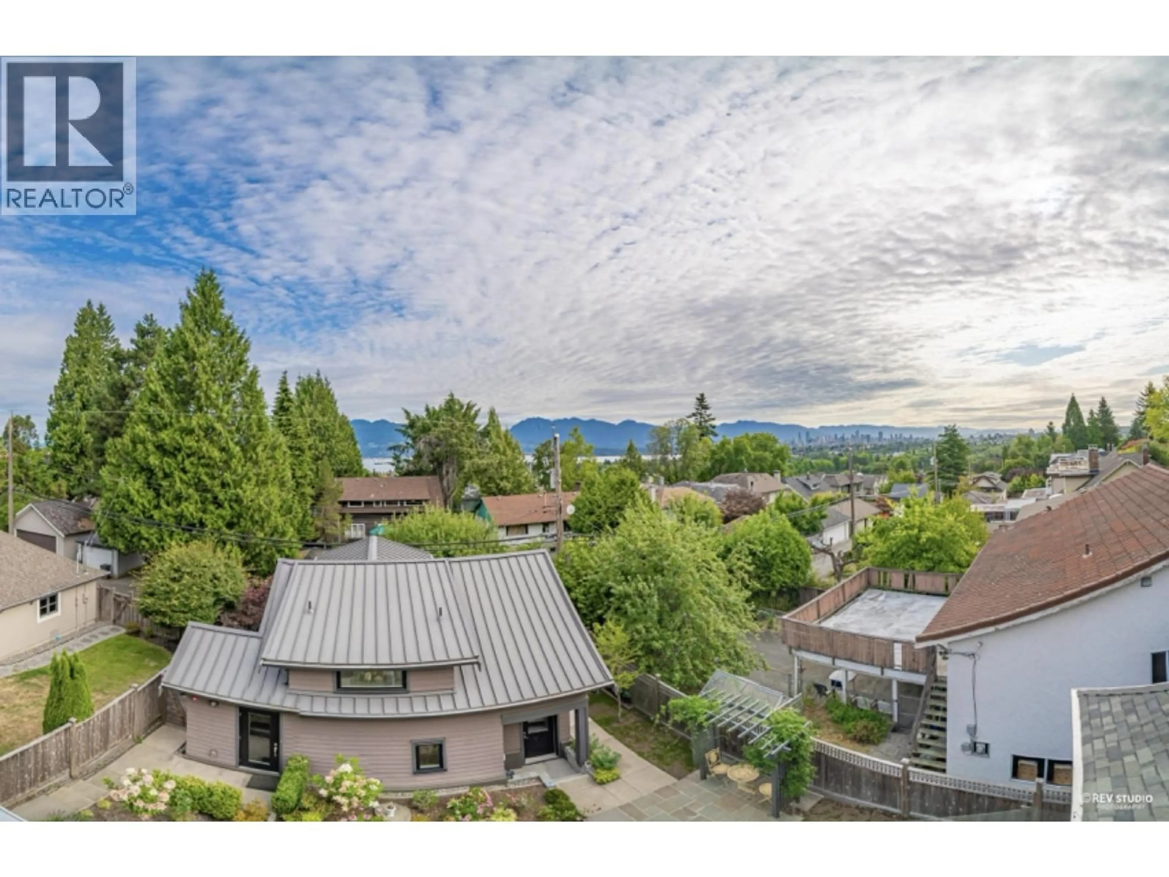 A pic from outside/outdoor area/front of a property/back of a property/a pic from drone, mountain view for 3853 14TH AVENUE, Vancouver British Columbia V6R2X1