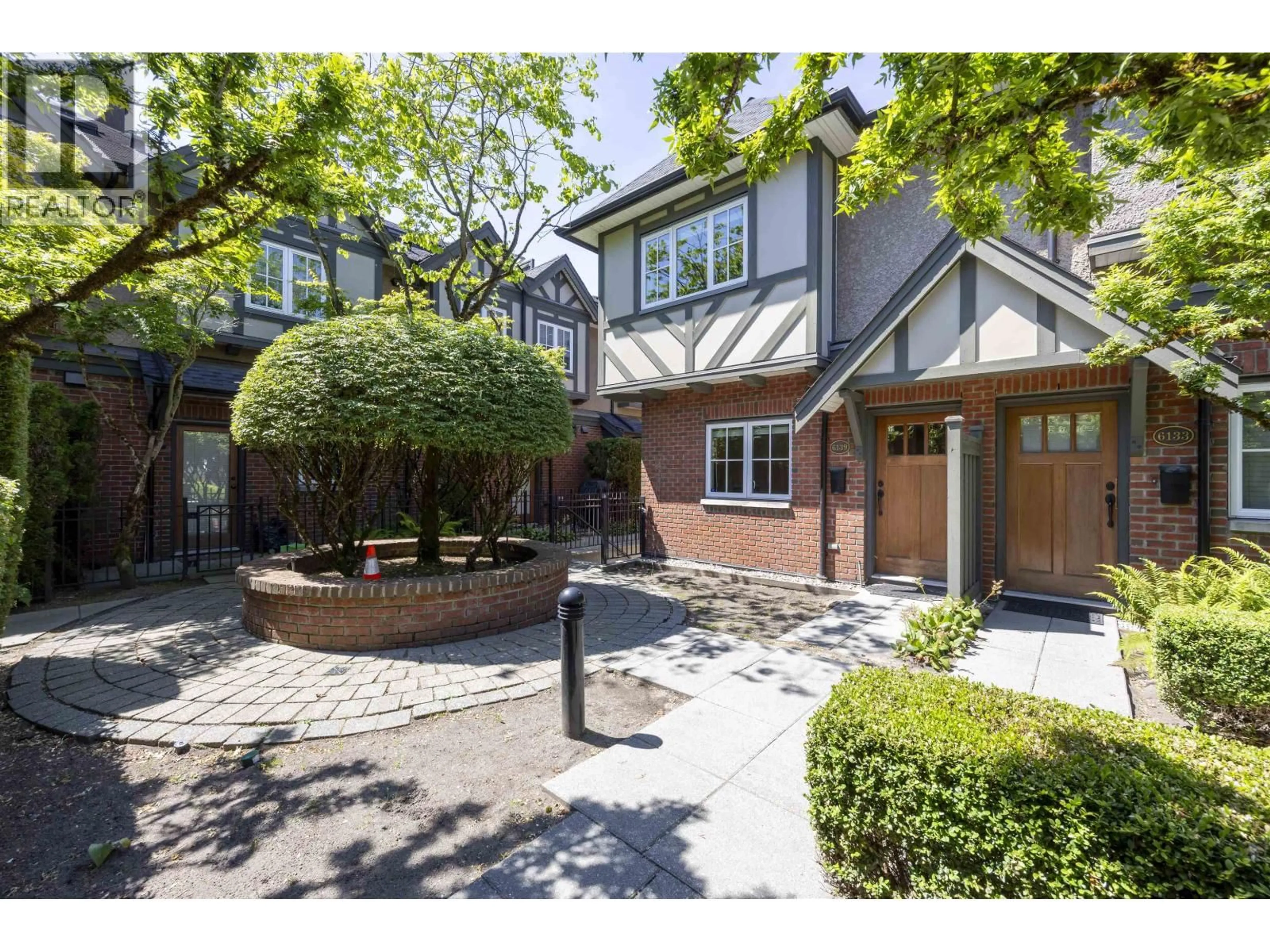 Home with brick exterior material, street for 6139 OAK STREET, Vancouver British Columbia V6M2W3