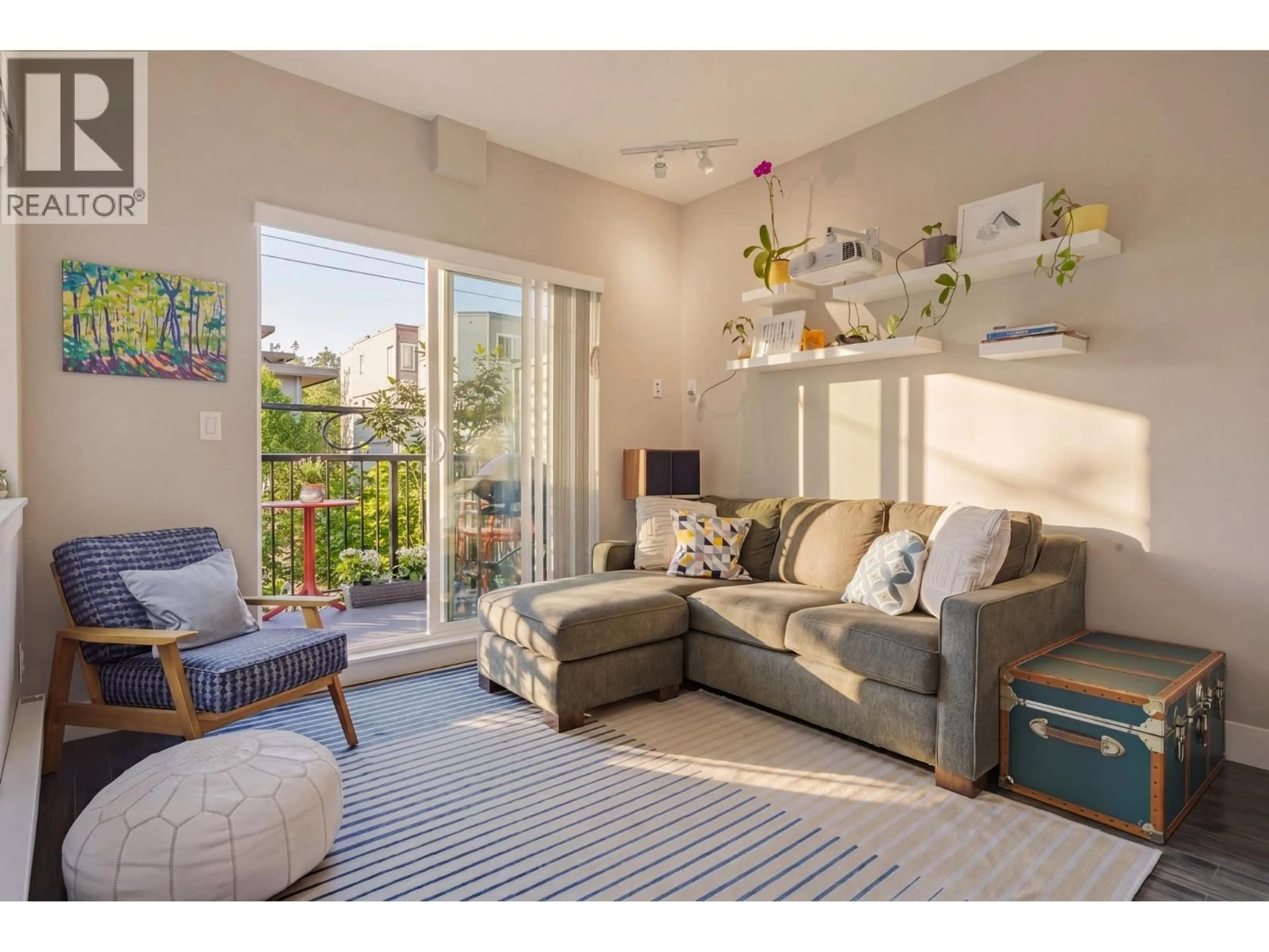 Living room with furniture, unknown for 215 - 2273 TRIUMPH STREET, Vancouver British Columbia V5L1L2