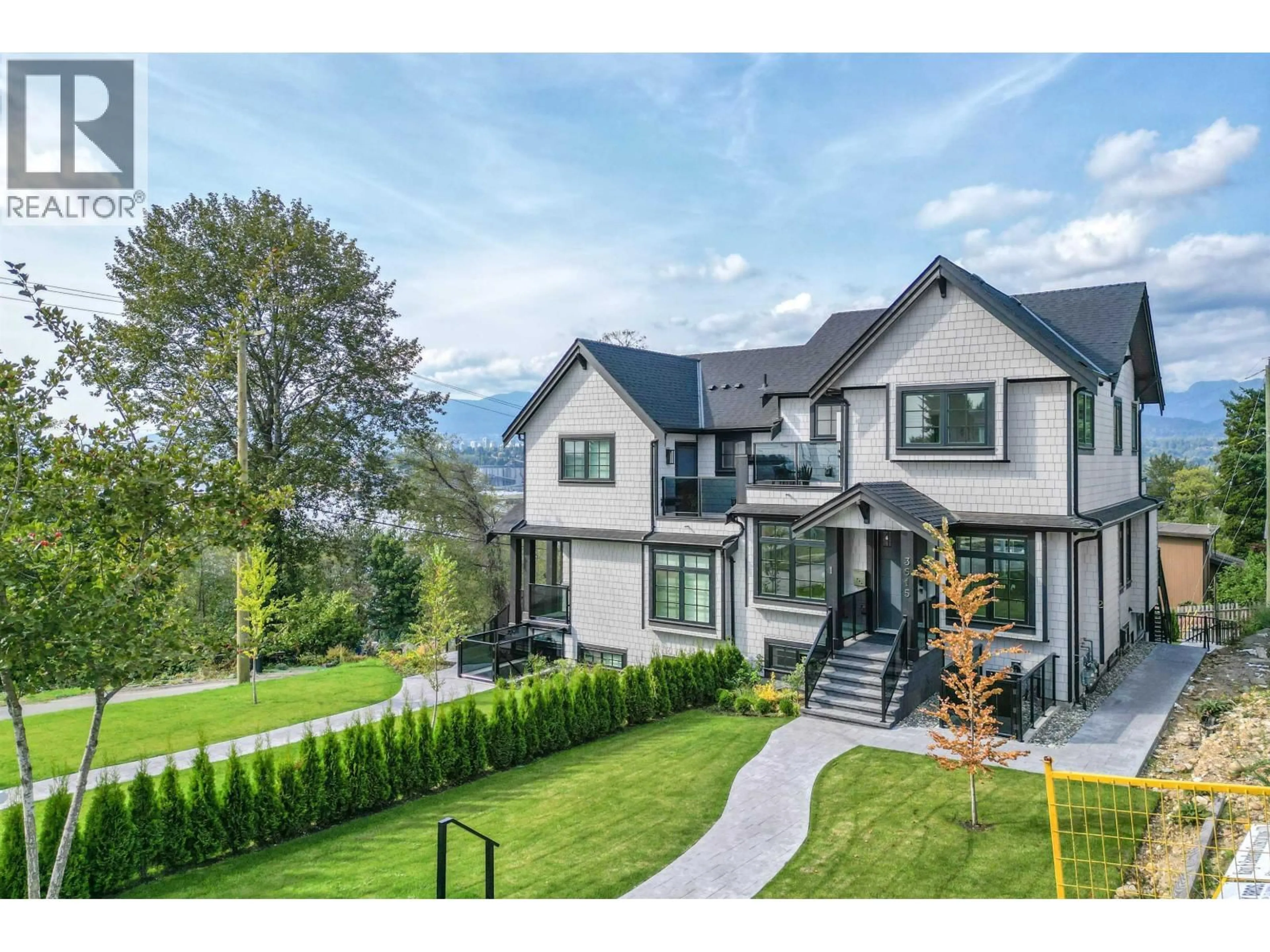 A pic from outside/outdoor area/front of a property/back of a property/a pic from drone, mountain view for 3615 YALE STREET, Vancouver British Columbia V5K1C8