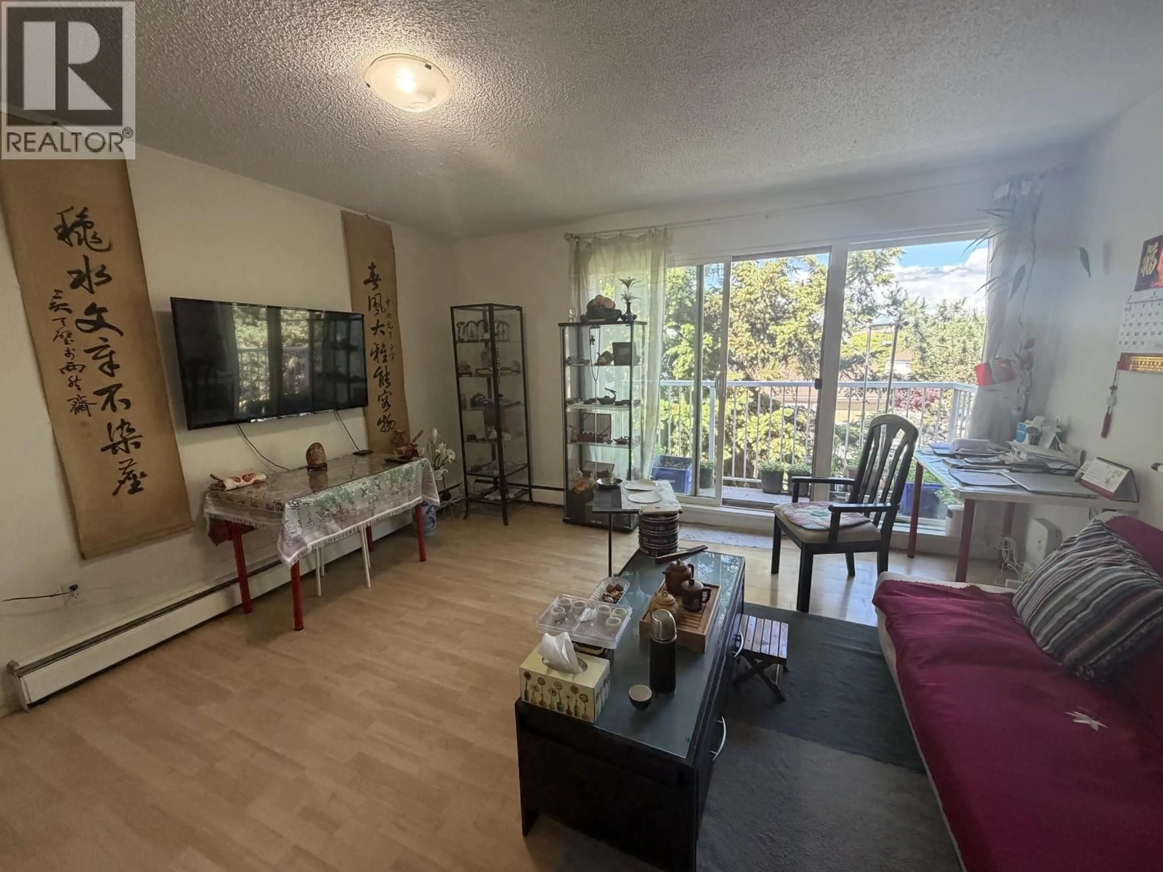 Living room with furniture, unknown for 304 - 7180 LINDSAY ROAD, Richmond British Columbia V7C3M6