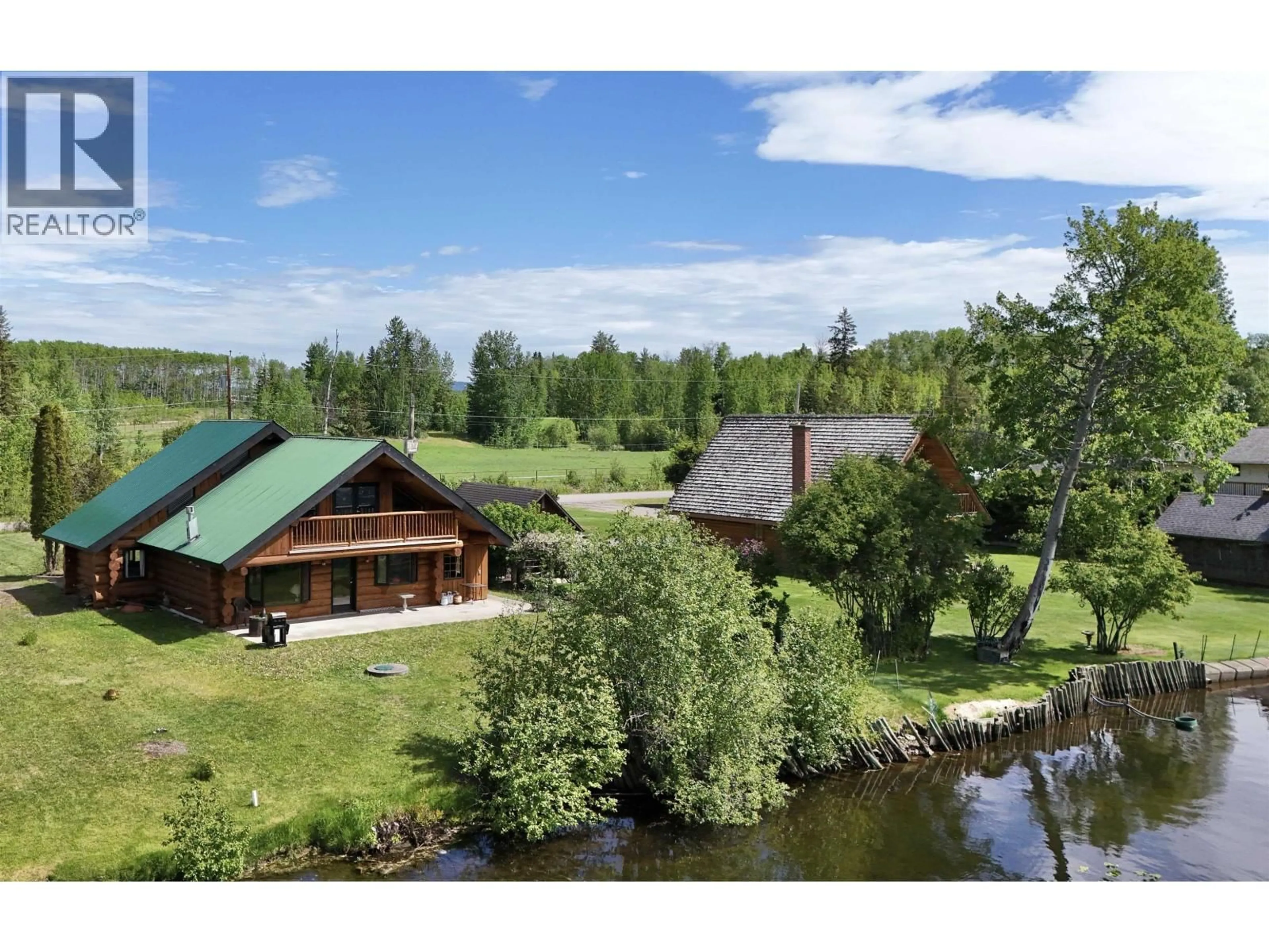 A pic from outside/outdoor area/front of a property/back of a property/a pic from drone, water/lake/river/ocean view for 6463 HETHERINGTON ROAD, Smithers British Columbia V0J2N2