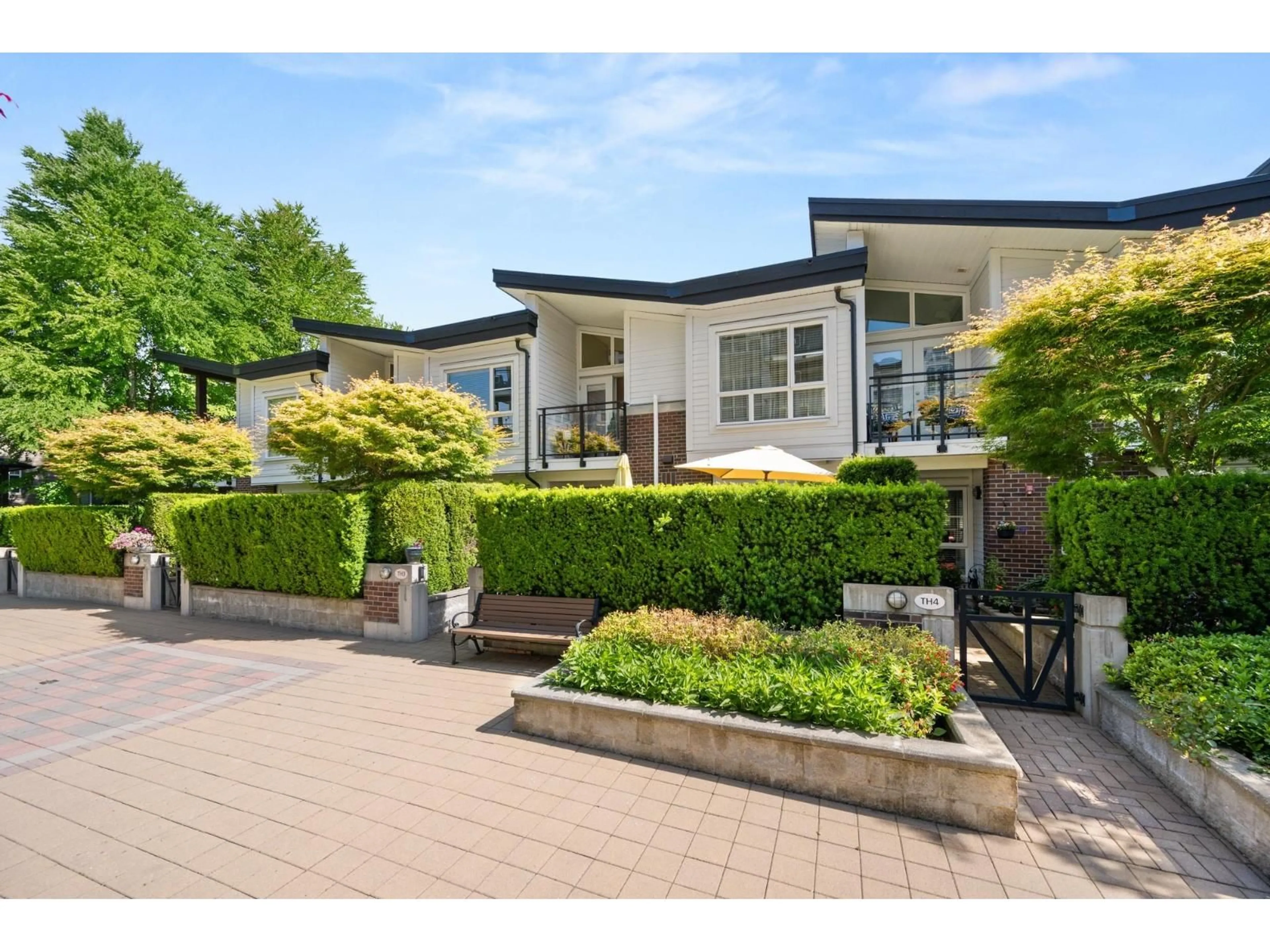 A pic from outside/outdoor area/front of a property/back of a property/a pic from drone, street for 3 - 23215 BILLY BROWN ROAD, Langley British Columbia V1M0B7