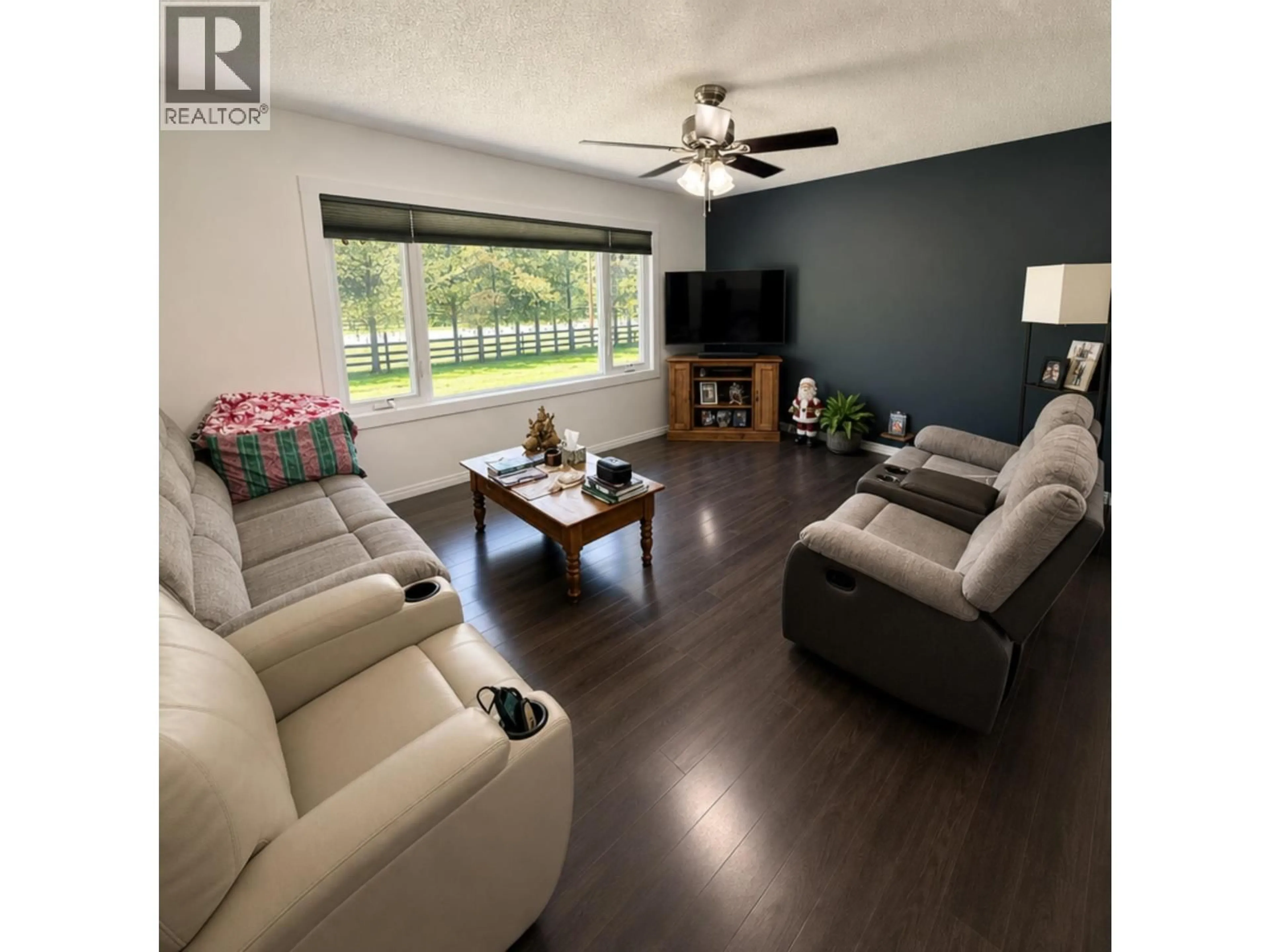 Living room with furniture, wood/laminate floor for 1480 DAVID DRIVE, Prince George British Columbia V2N6V7
