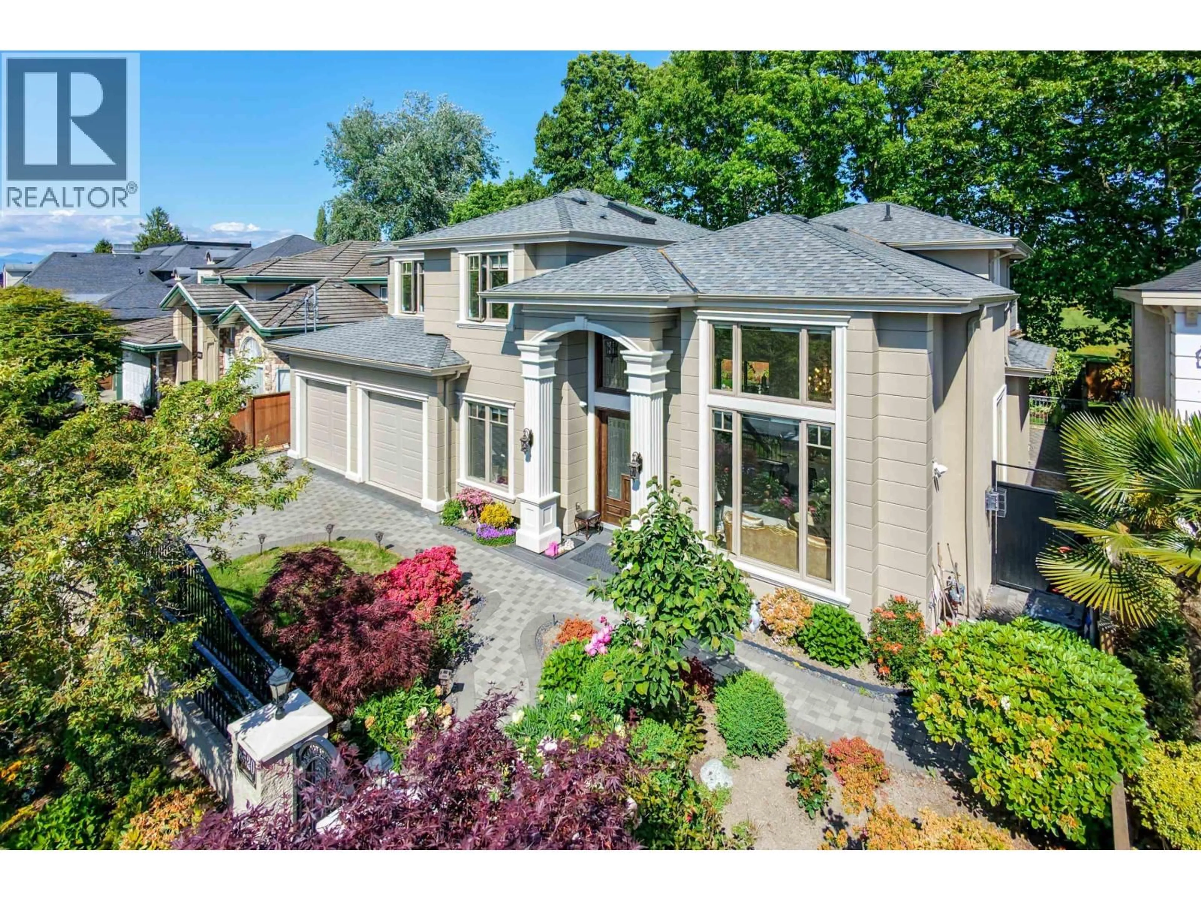 A pic from outside/outdoor area/front of a property/back of a property/a pic from drone, street for 8520 ELSMORE ROAD, Richmond British Columbia V7C2A1