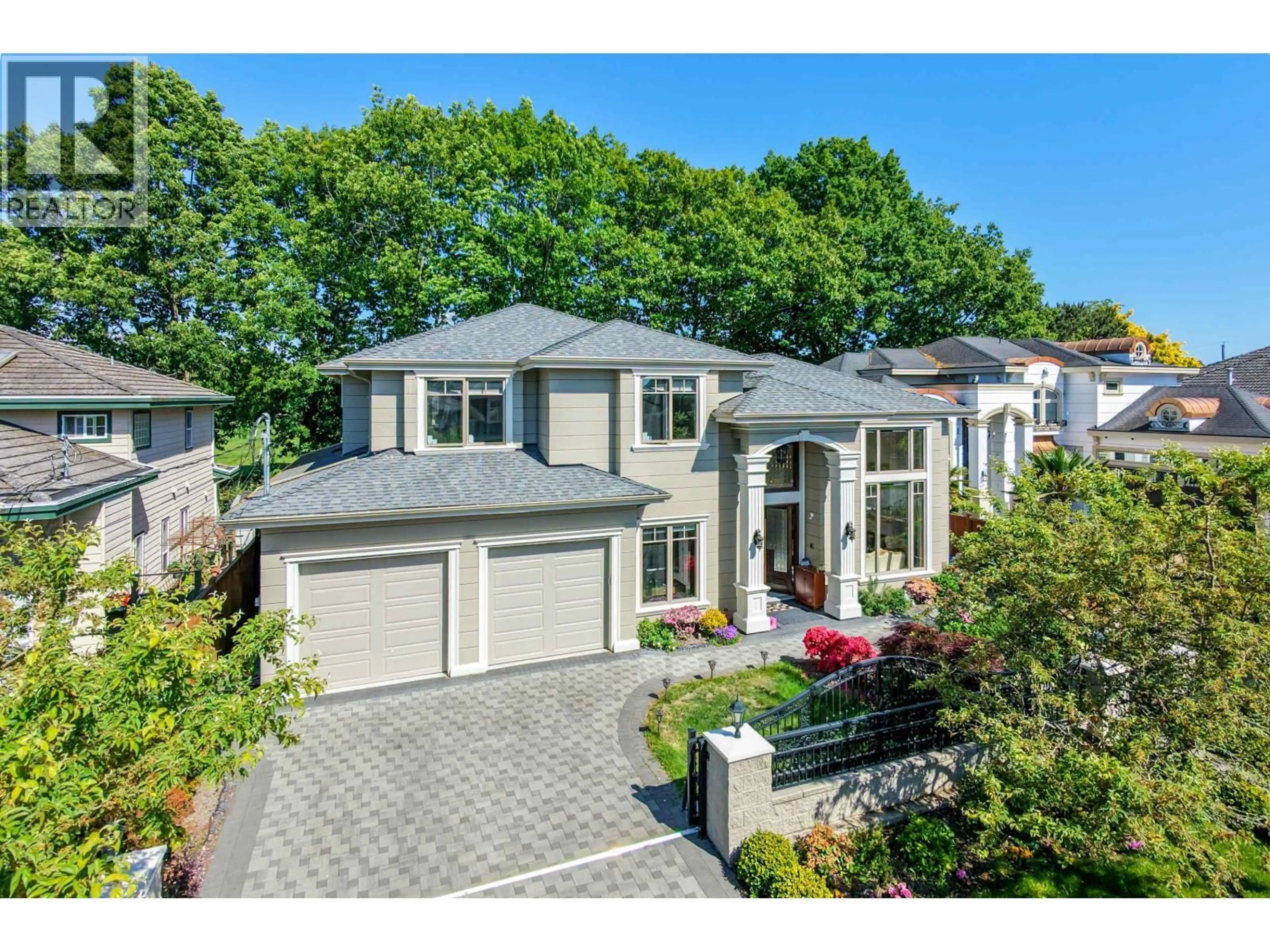 A pic from outside/outdoor area/front of a property/back of a property/a pic from drone, street for 8520 ELSMORE ROAD, Richmond British Columbia V7C2A1