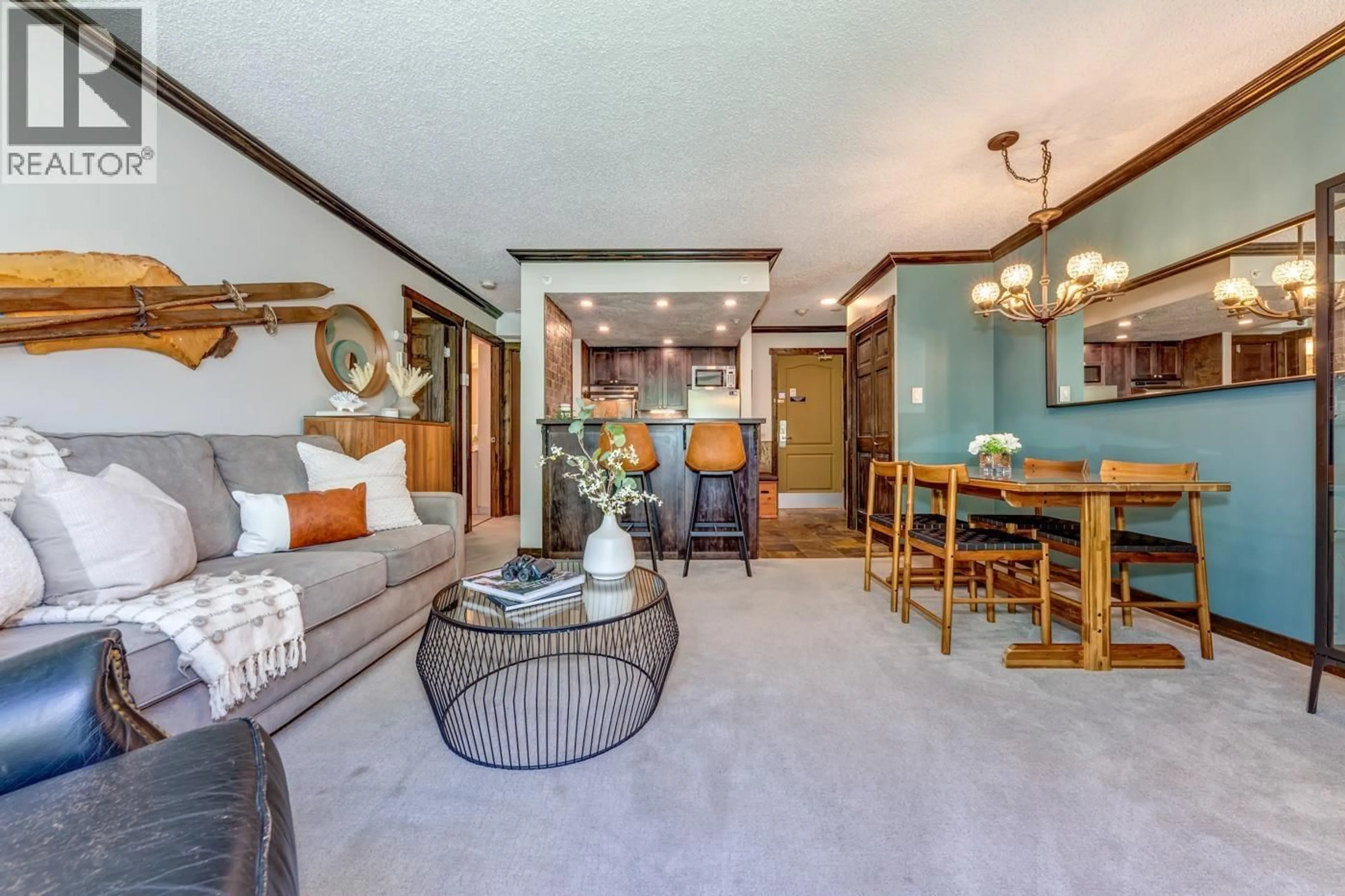 Living room with furniture, unknown for 404 - 4809 SPEARHEAD DRIVE, Whistler British Columbia V8E1E8