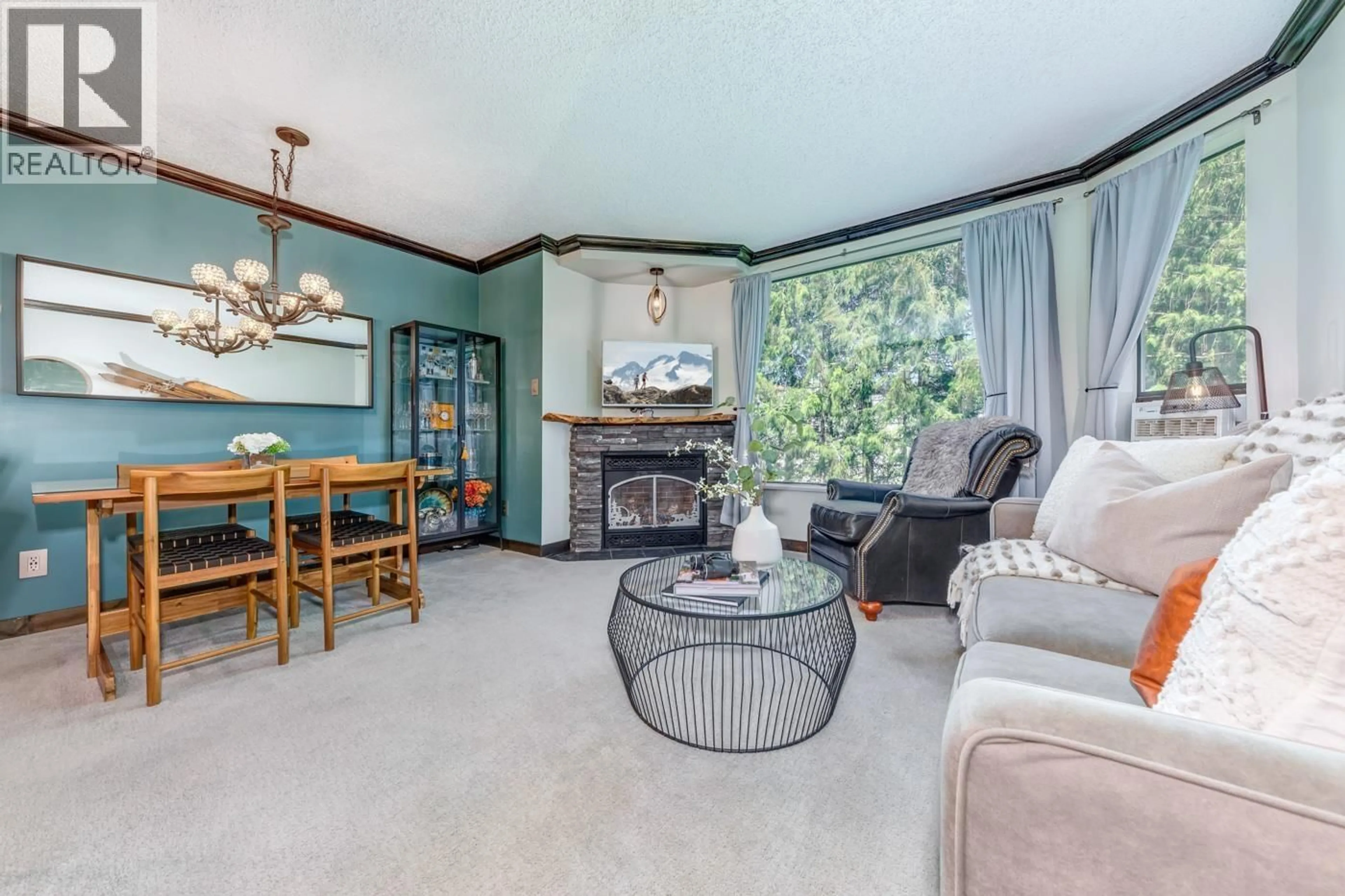 Living room with furniture, unknown for 404 - 4809 SPEARHEAD DRIVE, Whistler British Columbia V8E1E8