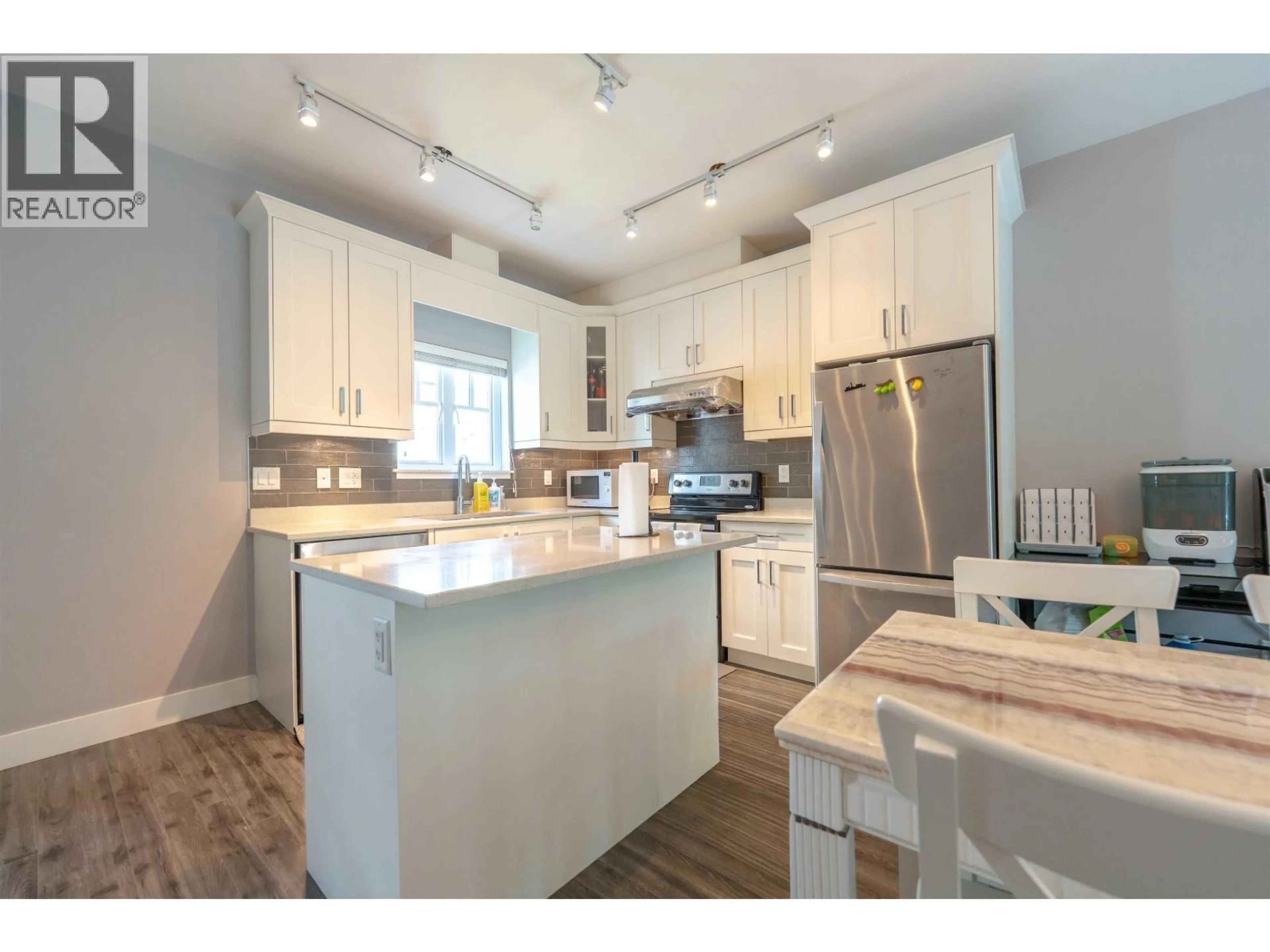 Open concept kitchen, unknown for 205 - 2263 TRIUMPH STREET, Vancouver British Columbia V5L1L2