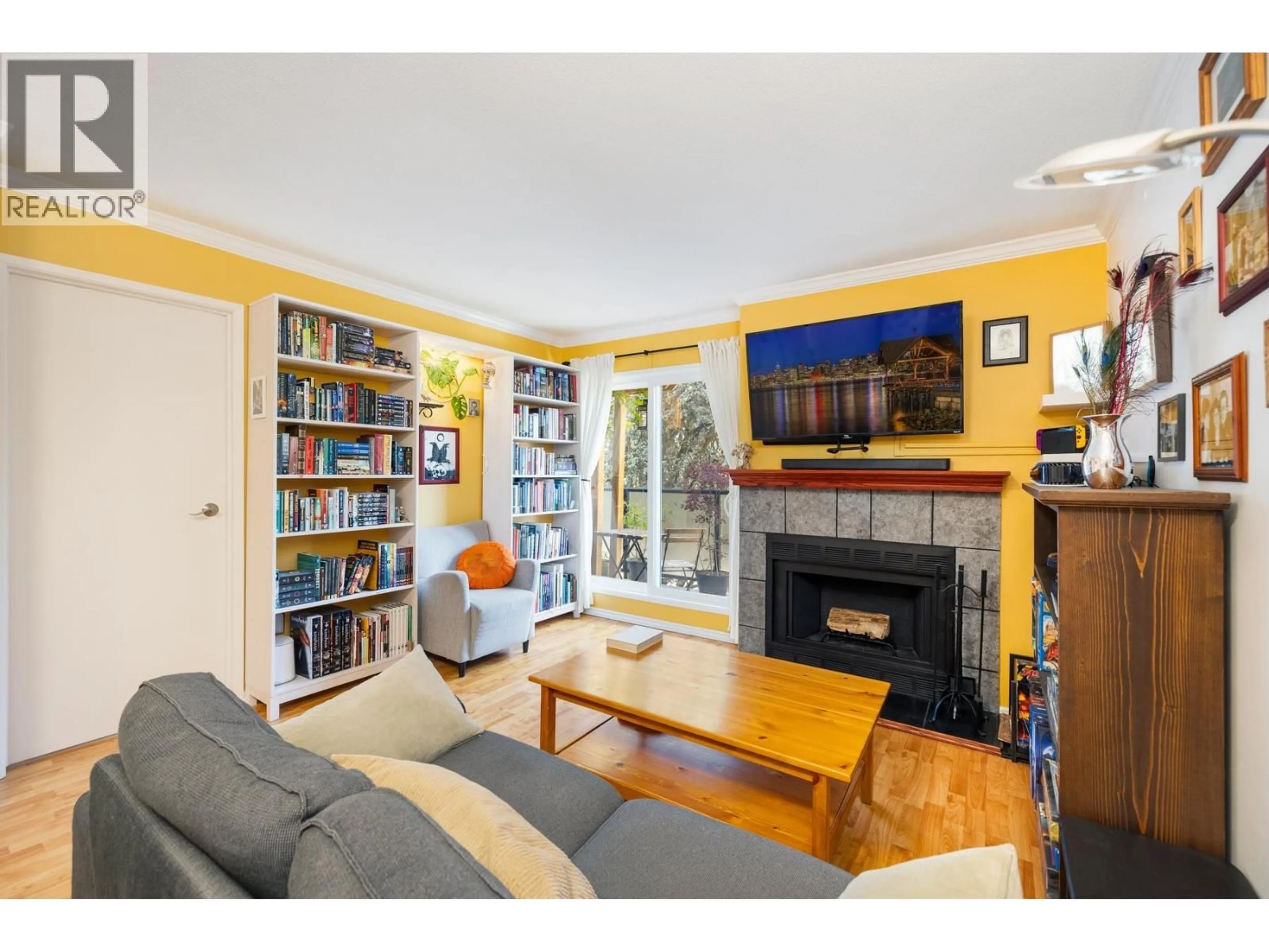 Living room with furniture, wood/laminate floor for 308 - 2255 ETON STREET, Vancouver British Columbia V5L1C9