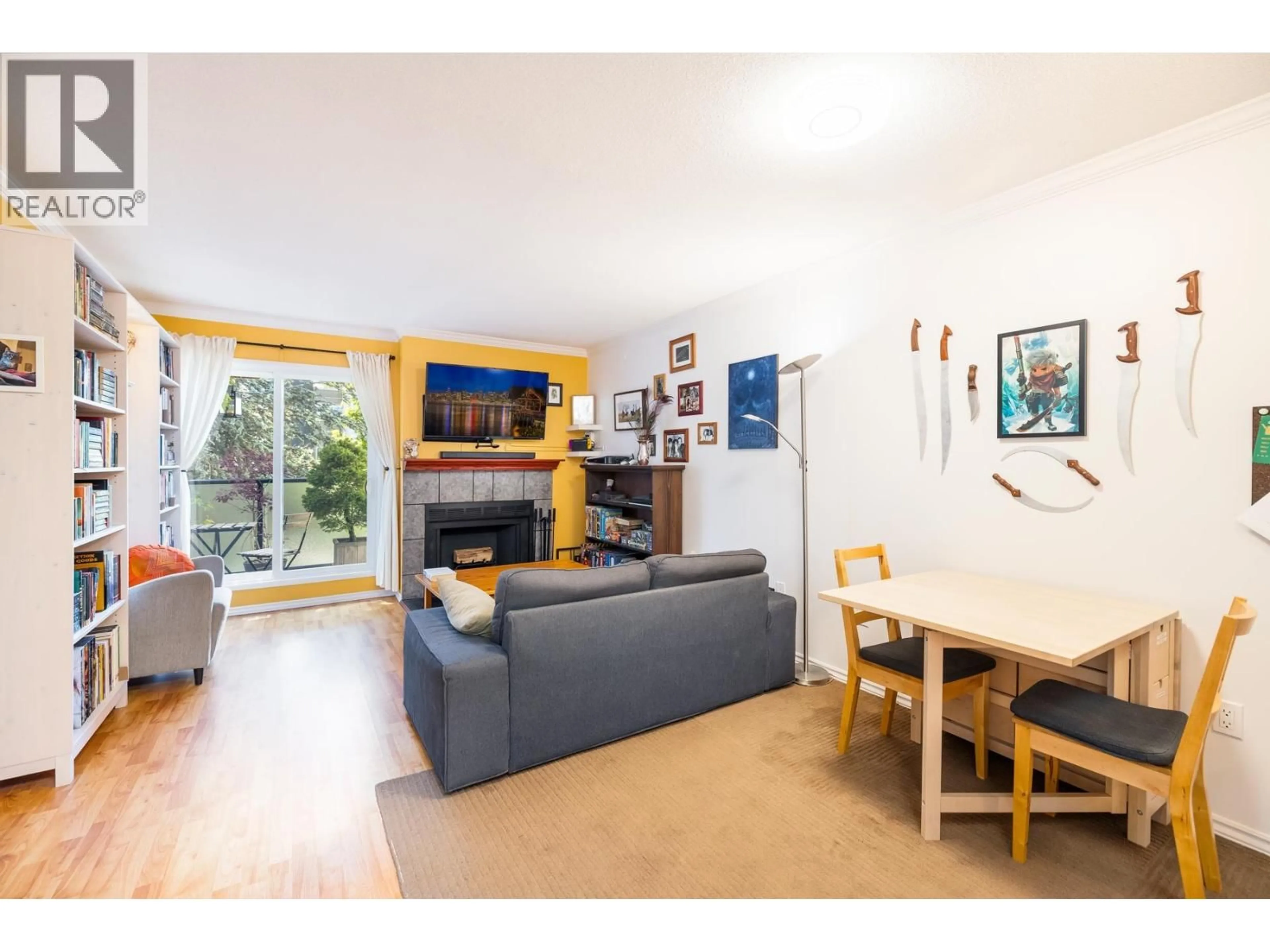Living room with furniture, wood/laminate floor for 308 - 2255 ETON STREET, Vancouver British Columbia V5L1C9