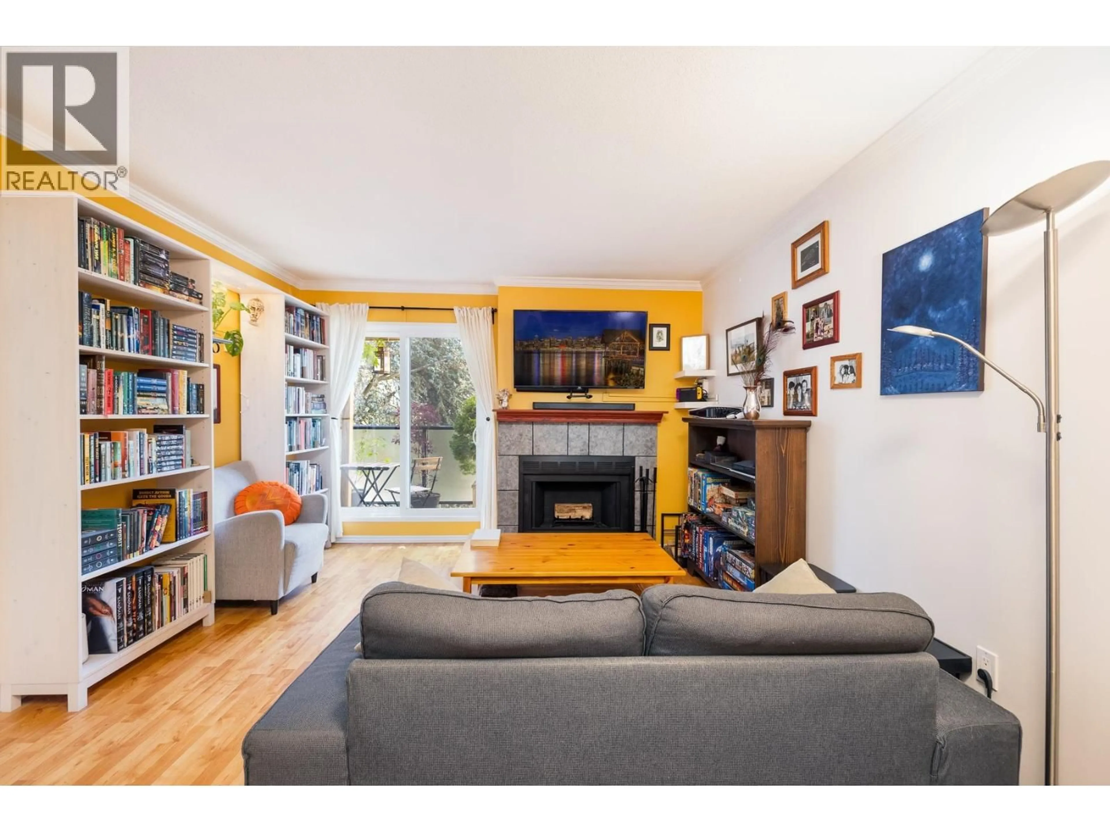 Living room with furniture, wood/laminate floor for 308 - 2255 ETON STREET, Vancouver British Columbia V5L1C9