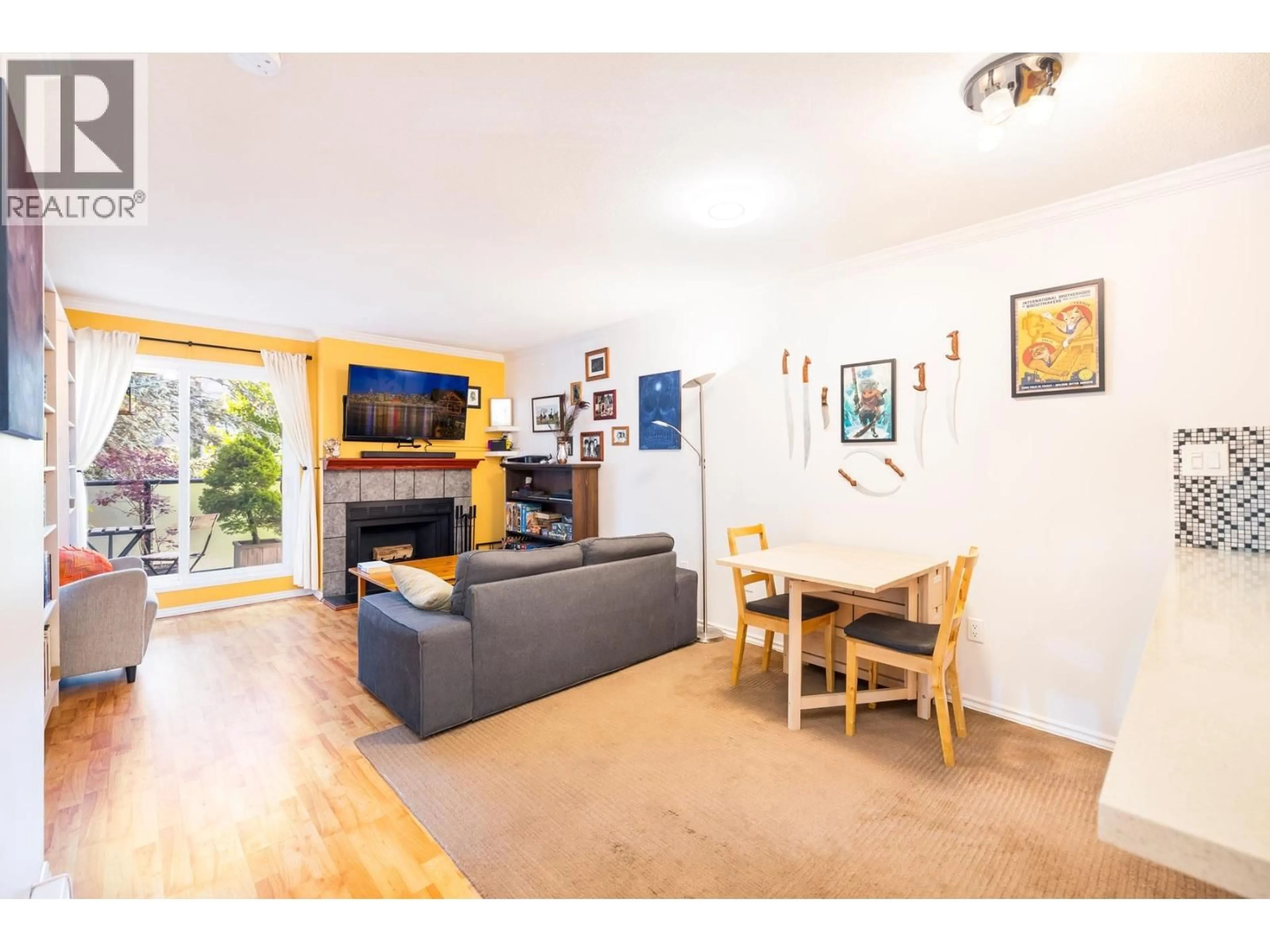 Living room with furniture, wood/laminate floor for 308 - 2255 ETON STREET, Vancouver British Columbia V5L1C9