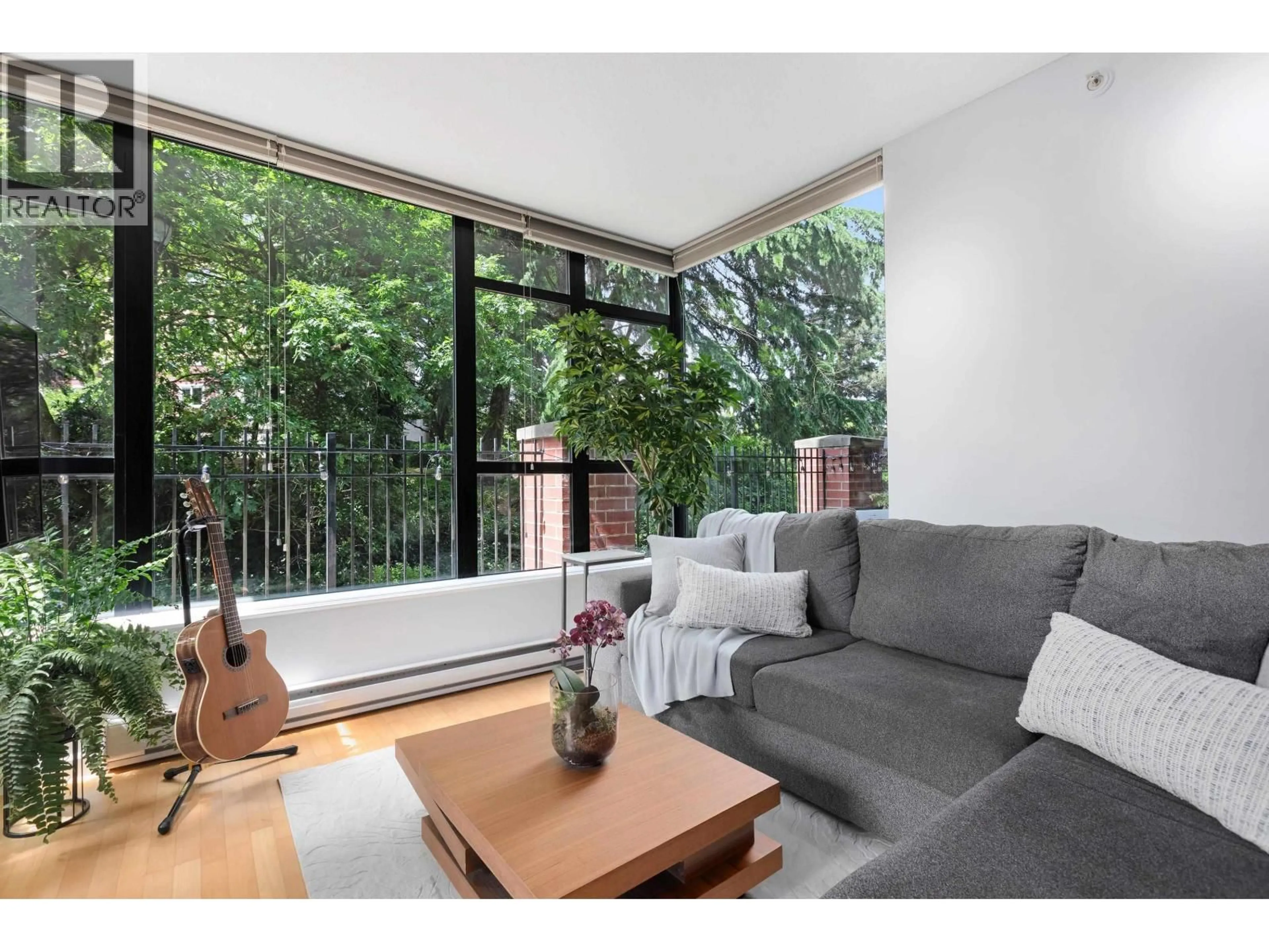 Living room with furniture, wood/laminate floor for 201 - 15 ROYAL AVENUE, New Westminster British Columbia V3L0A9