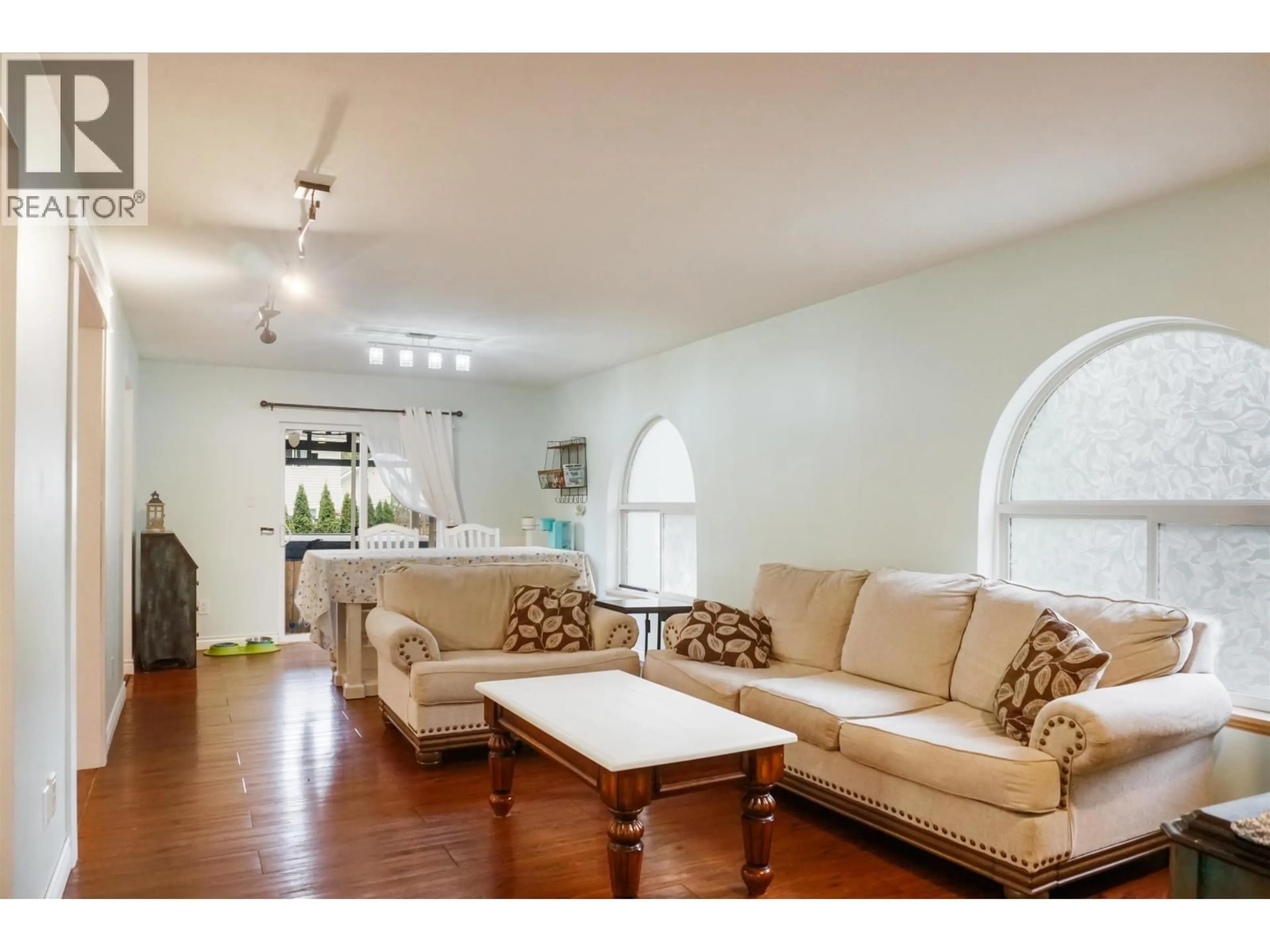 Living room with furniture, wood/laminate floor for 4947 HUNDAL DRIVE, Terrace British Columbia V8G5N8