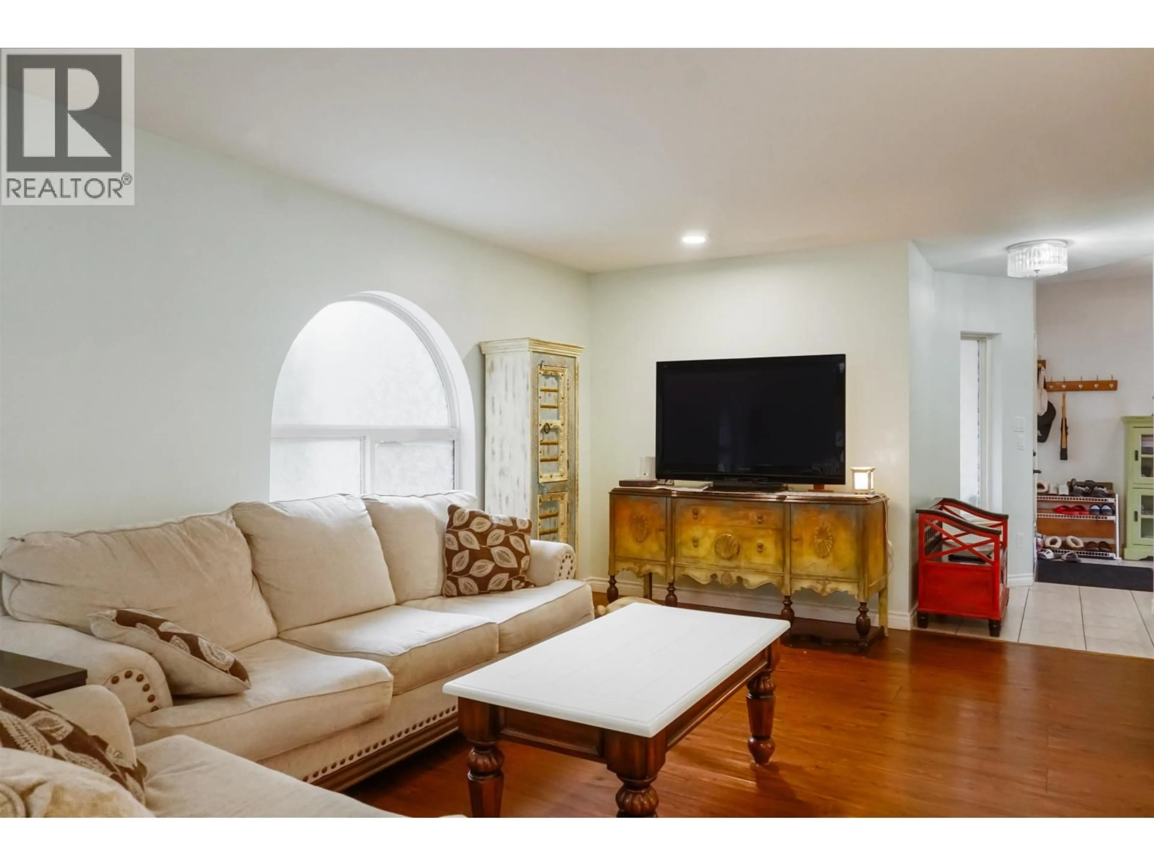 Living room with furniture, wood/laminate floor for 4947 HUNDAL DRIVE, Terrace British Columbia V8G5N8