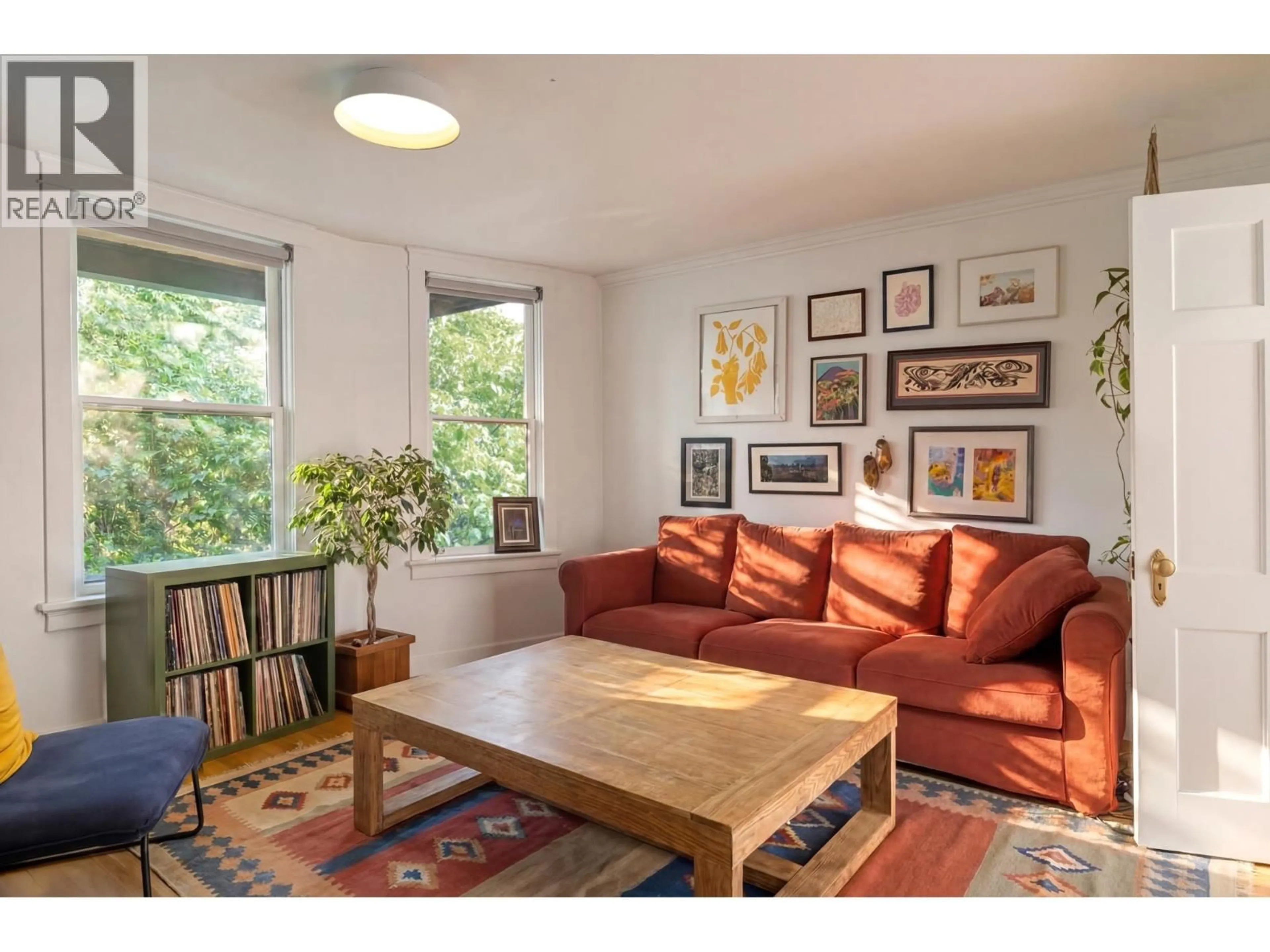 Living room with furniture, wood/laminate floor for 1746 WILLIAM STREET, Vancouver British Columbia V5L2R4