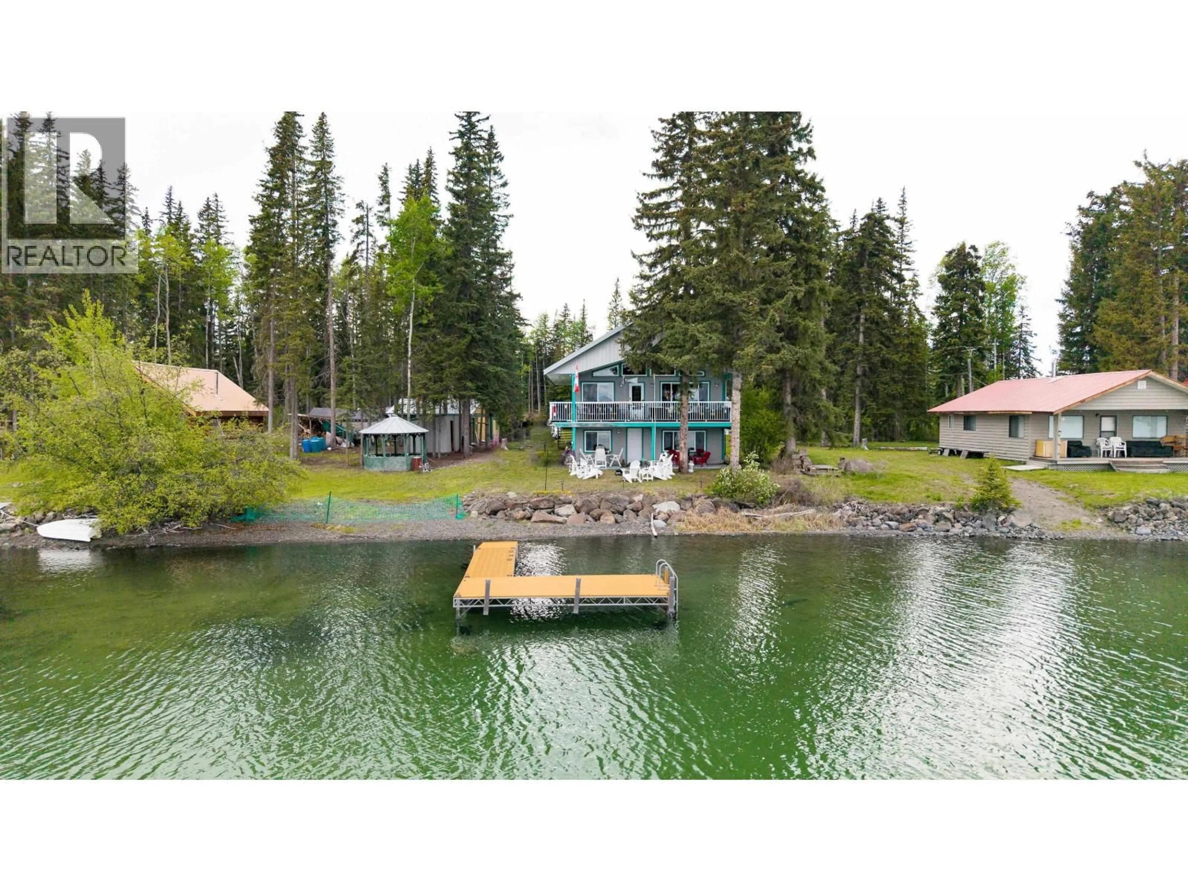 A pic from outside/outdoor area/front of a property/back of a property/a pic from drone, water/lake/river/ocean view for 7607 NORTH POINT ROAD, 100 Mile House British Columbia V0K1X1
