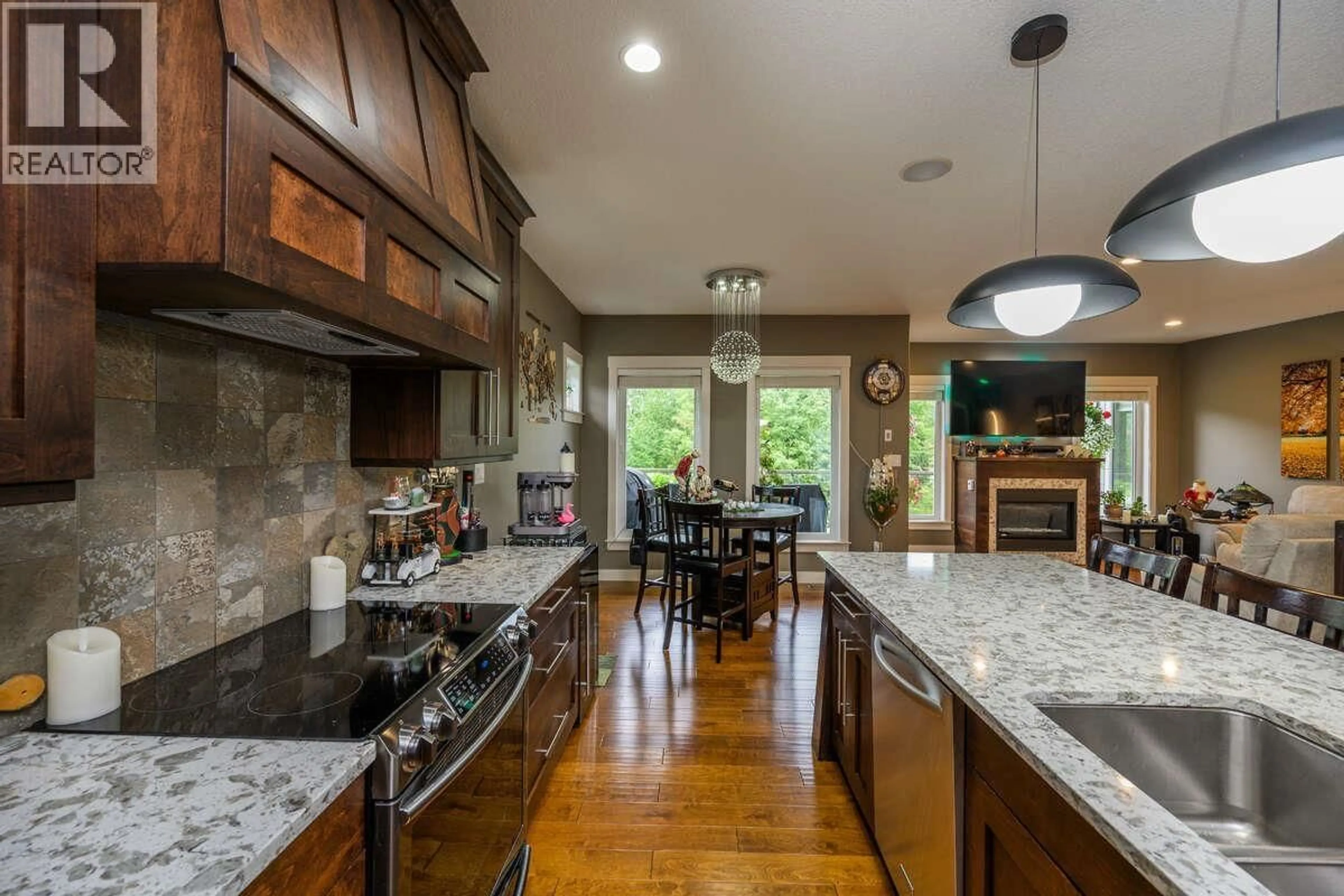 Open concept kitchen, ceramic/tile floor for 2693 LINKS DRIVE, Prince George British Columbia V2K0A5