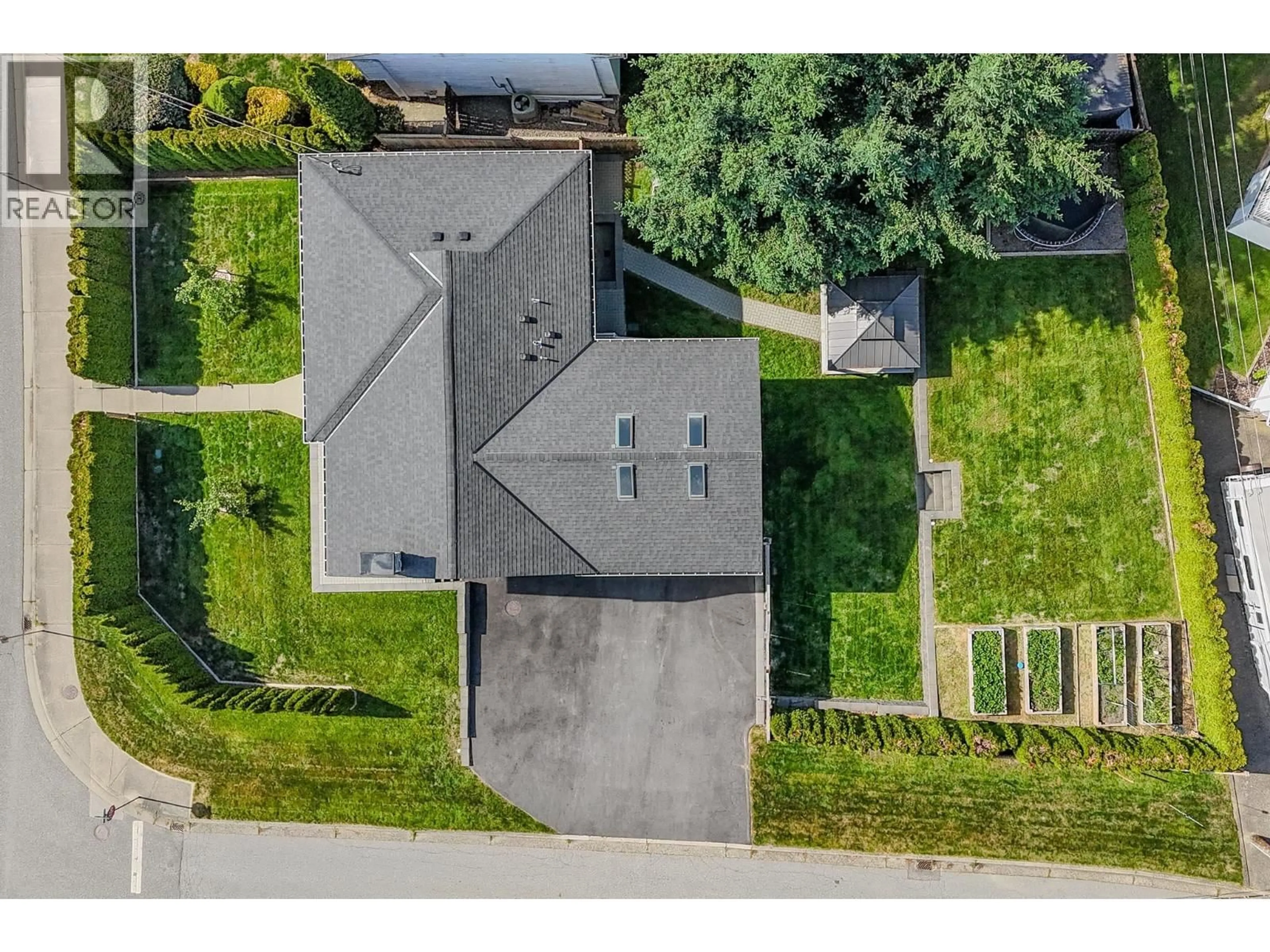A pic from outside/outdoor area/front of a property/back of a property/a pic from drone, street for 1616 EASTERN DRIVE, Port Coquitlam British Columbia V3C2T3