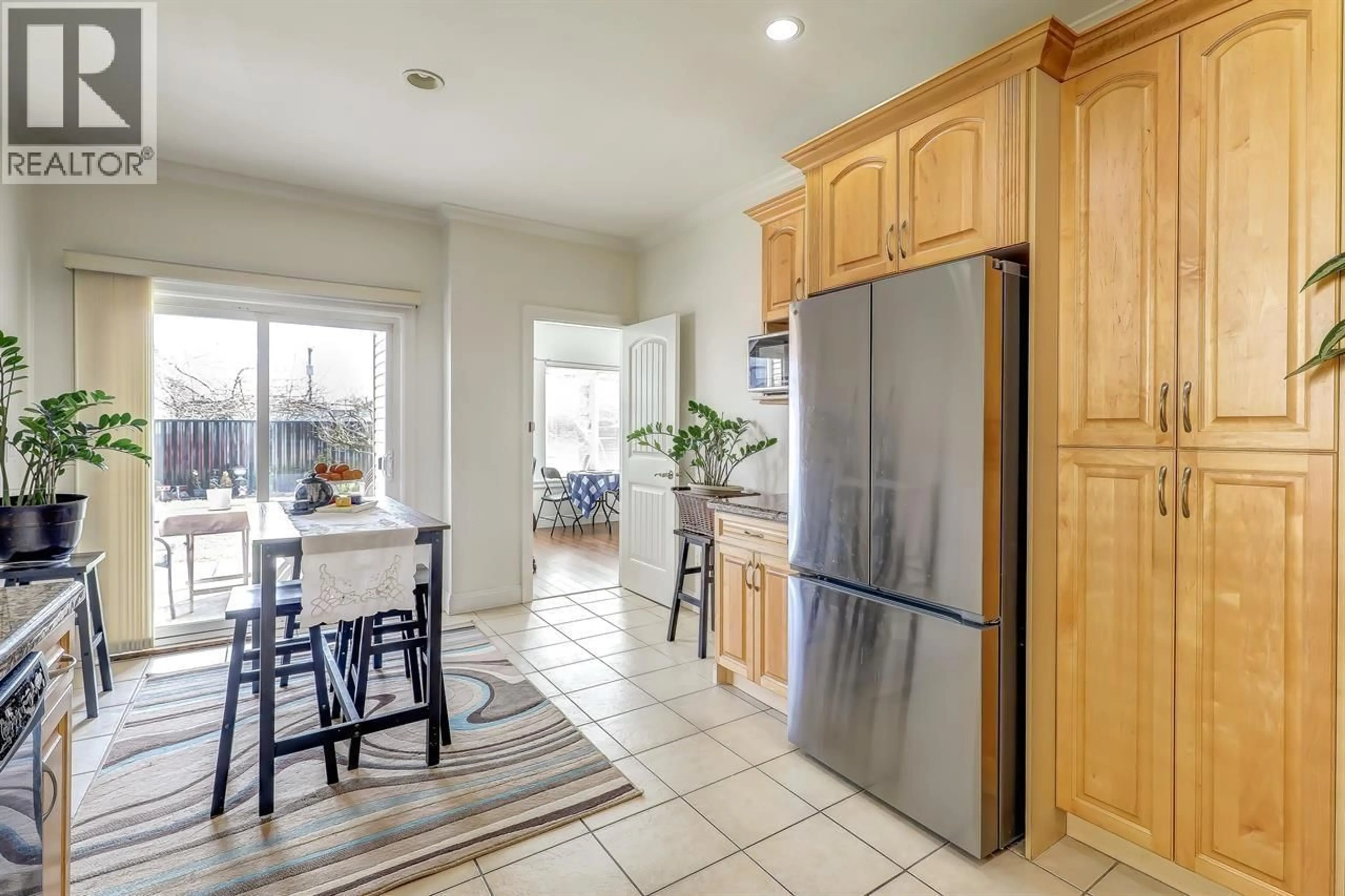 Open concept kitchen, ceramic/tile floor for 7448 17TH AVENUE, Burnaby British Columbia V3N1L4